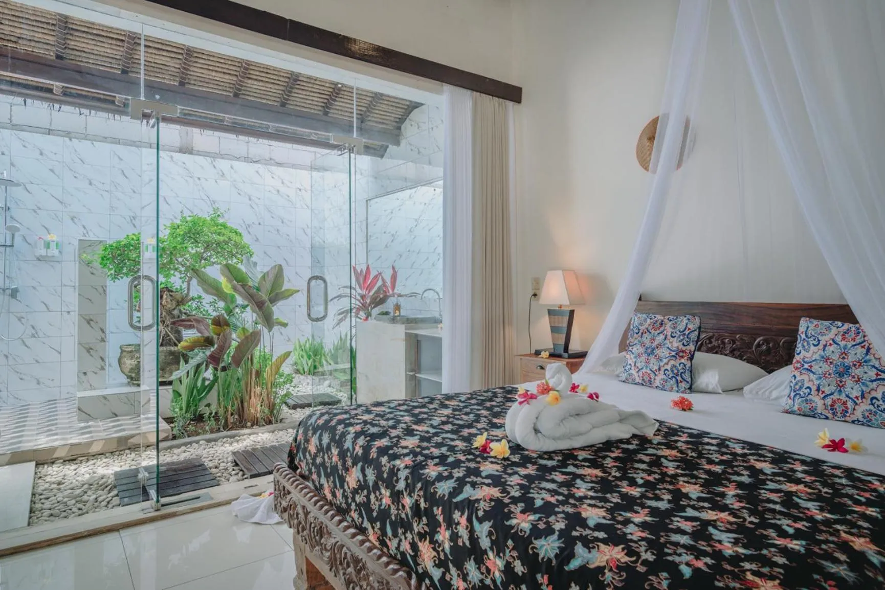 Bed in Frangipani Beach Hotel