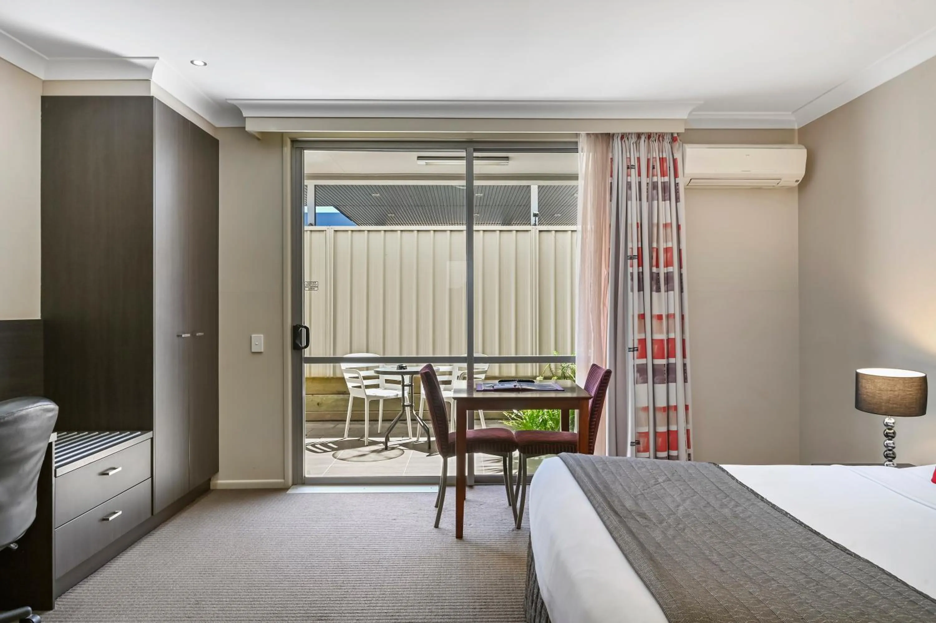 Photo of the whole room, Bed in Platinum International