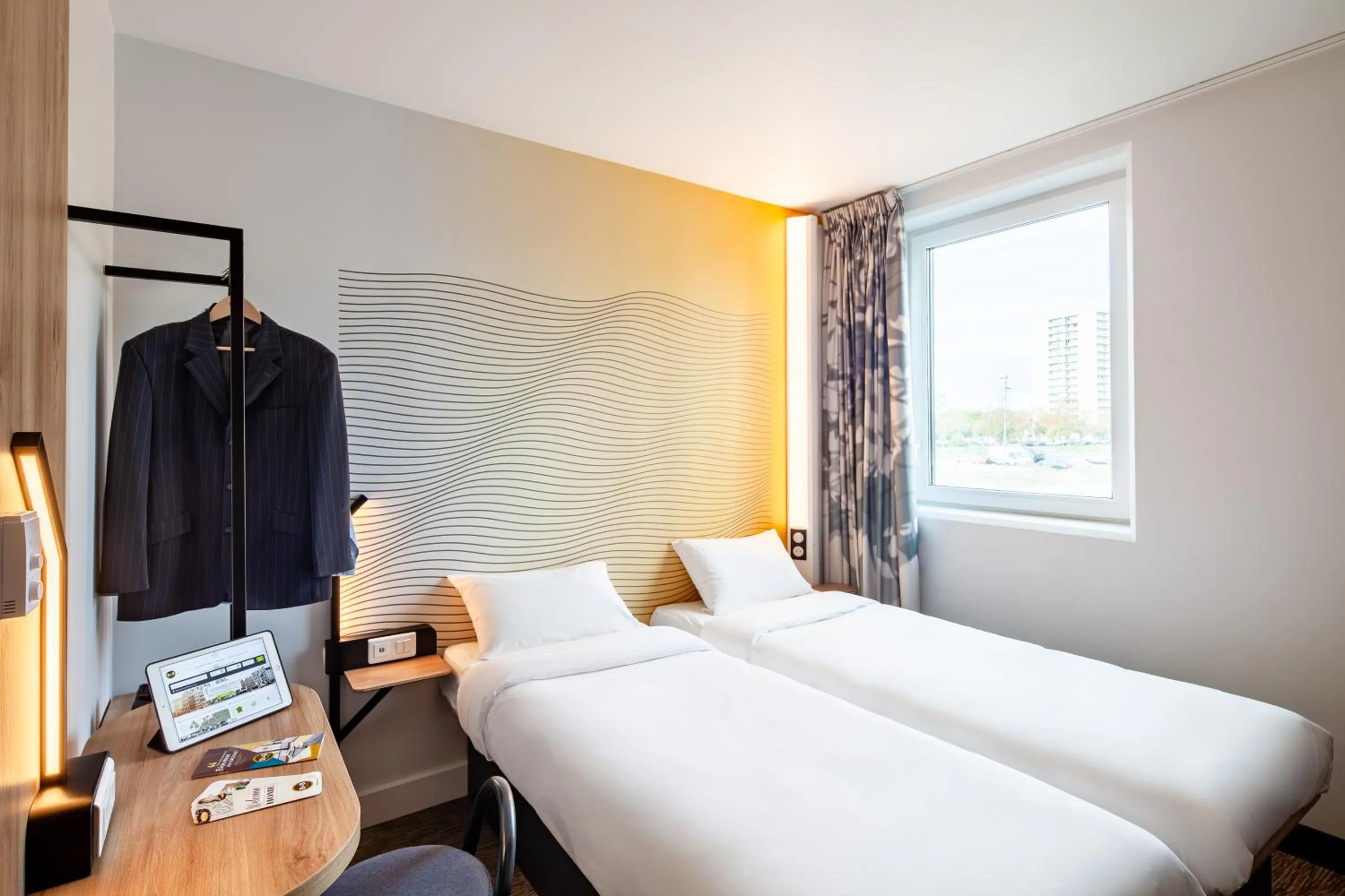 Decorative detail, Bed in B&B HOTEL Paris Gennevilliers Asnières