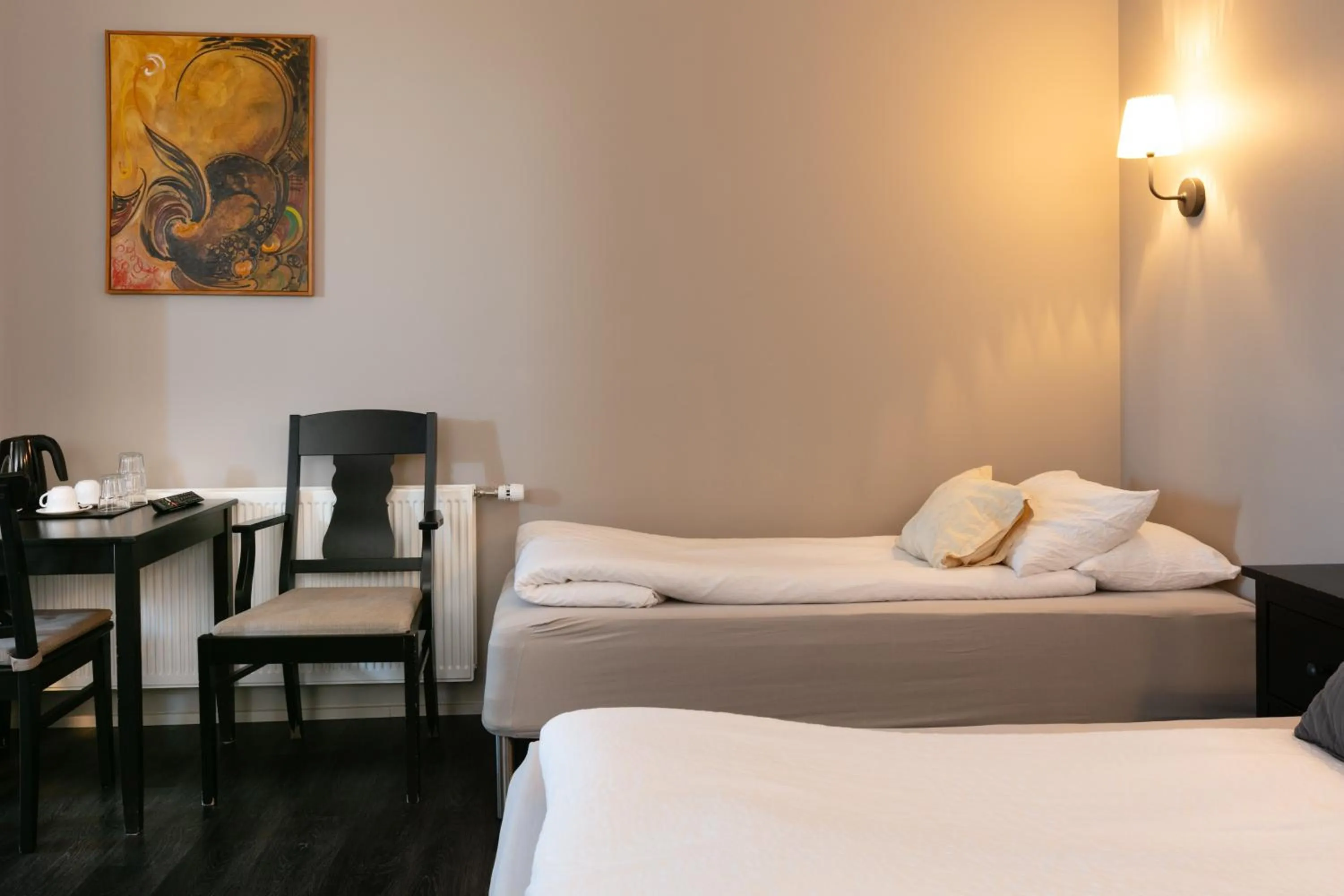 Bed in Karuna Guesthouse