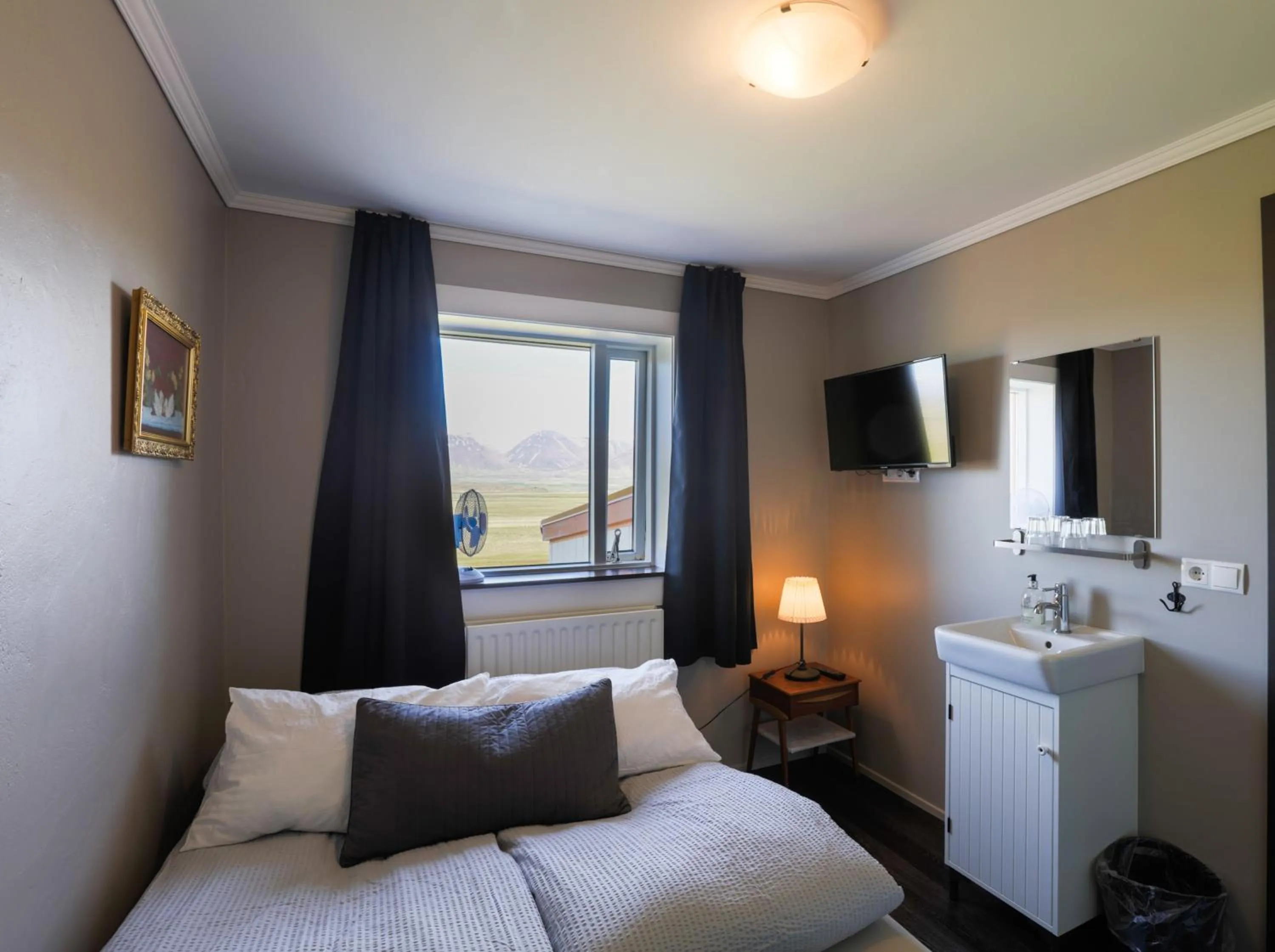 Bed in Karuna Guesthouse