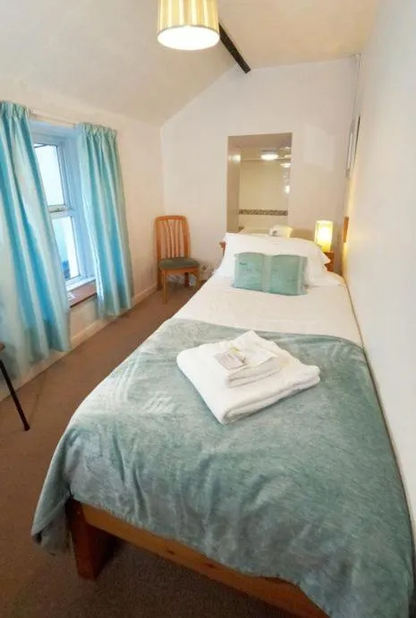 Bedroom, Bed in Strands Hotel/Screes Inn & Micro Brewery