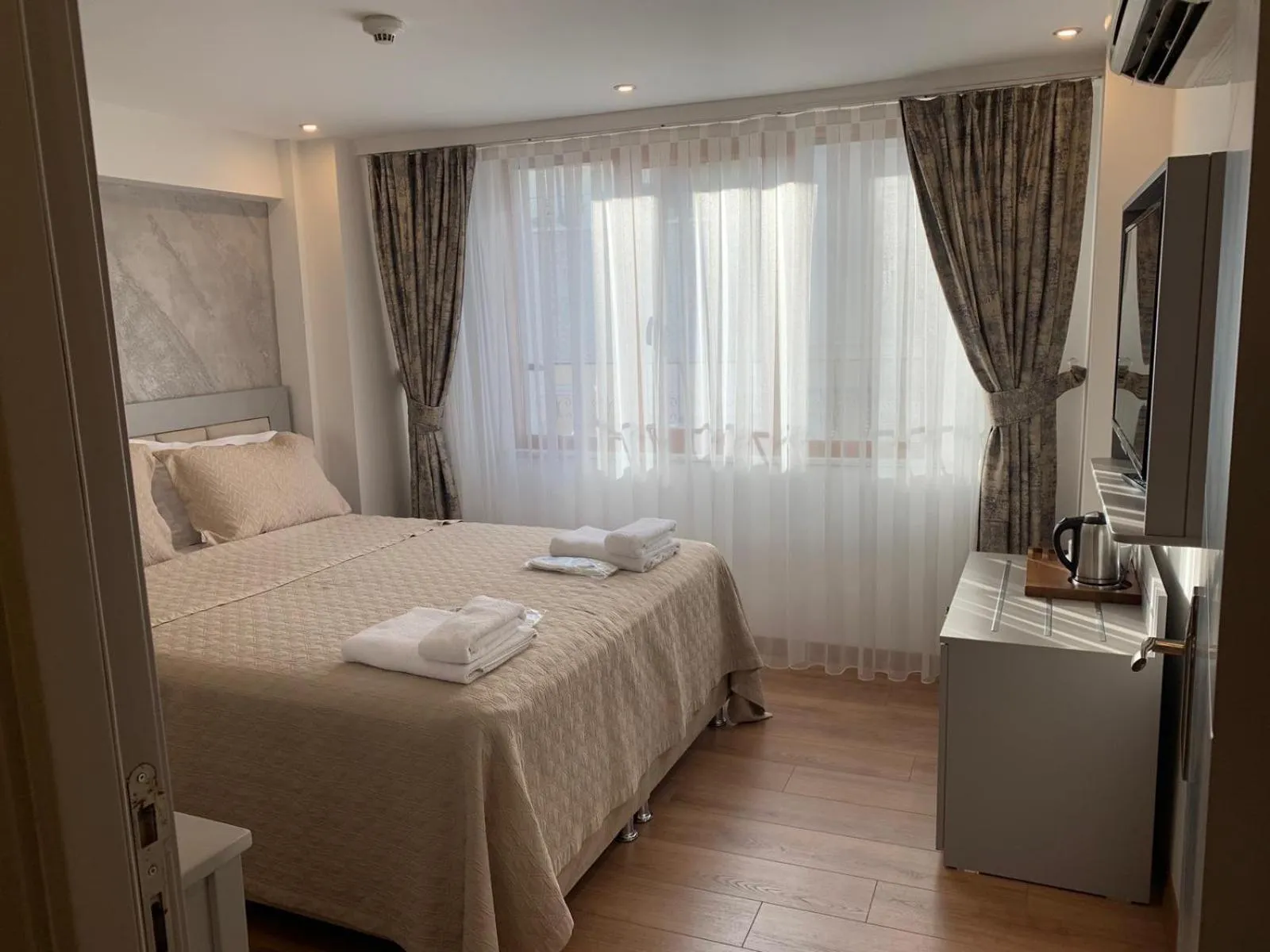 Bed in Regency World Hotel