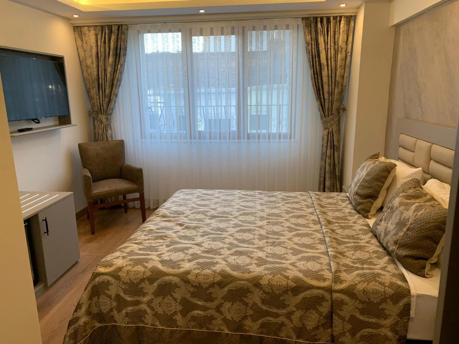 Bed in Regency World Hotel