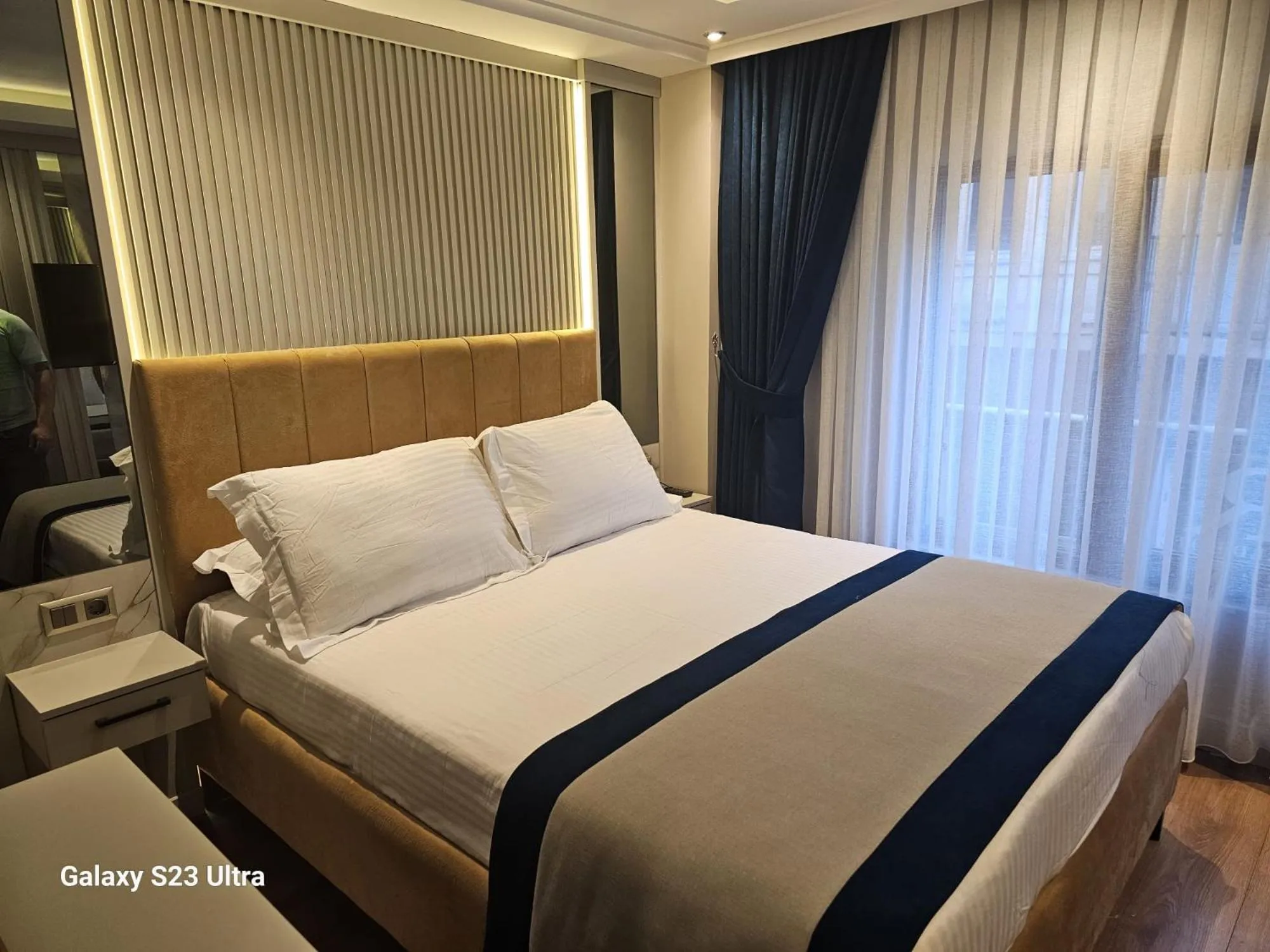 Bed in Regency World Hotel