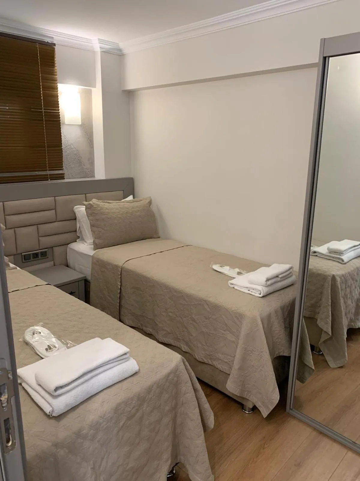 Bed in Regency World Hotel