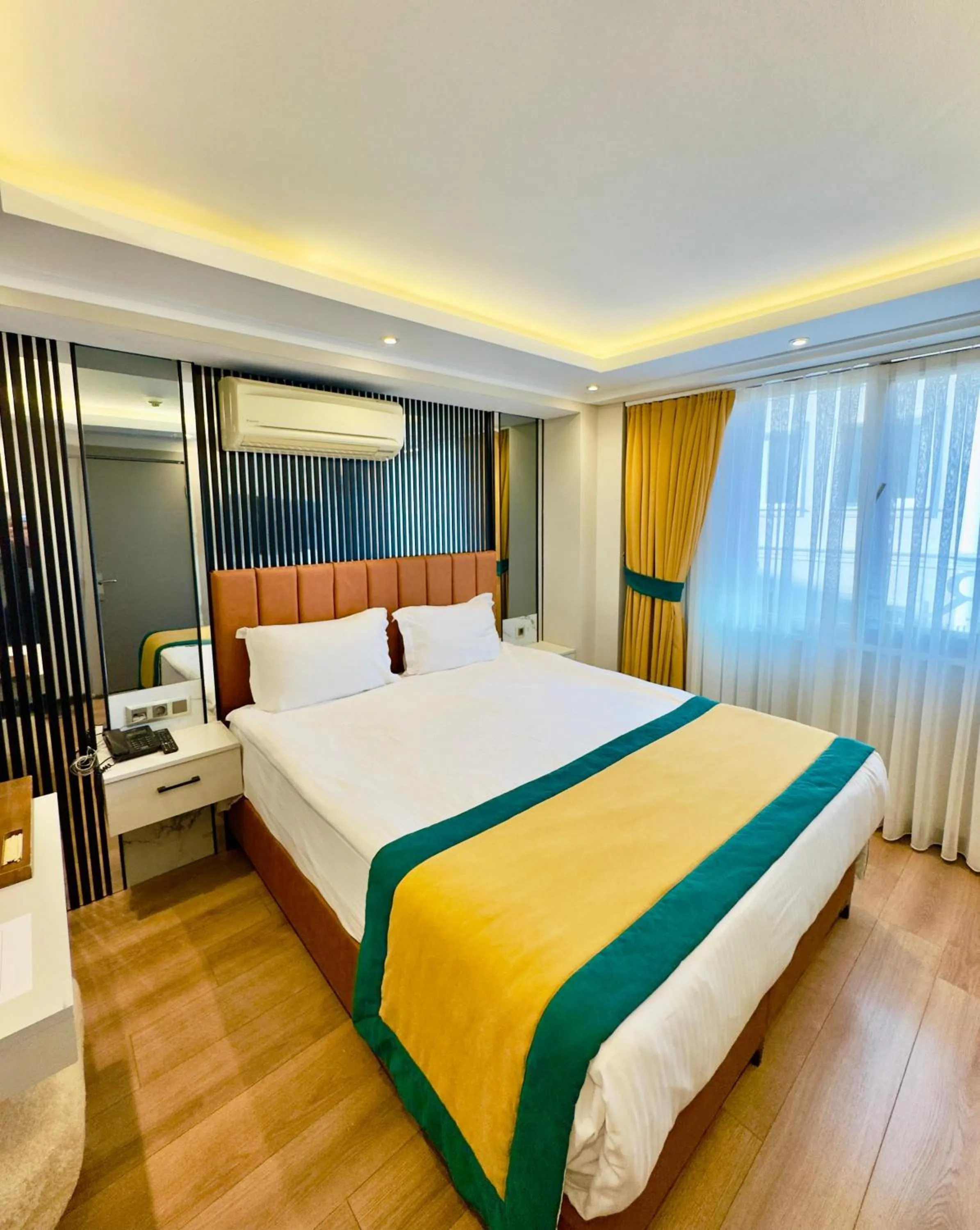 Bed in Regency World Hotel