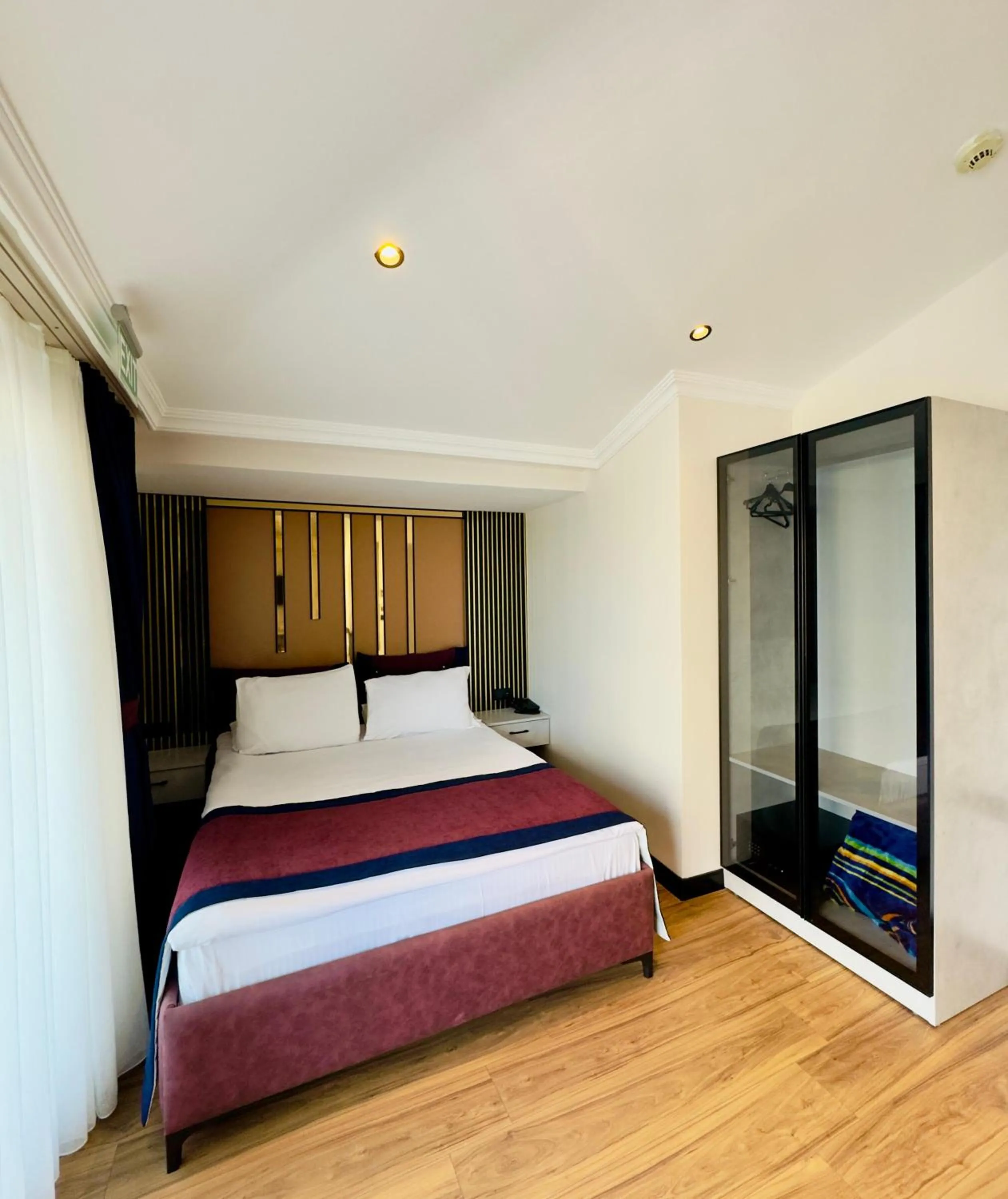 Bed in Regency World Hotel