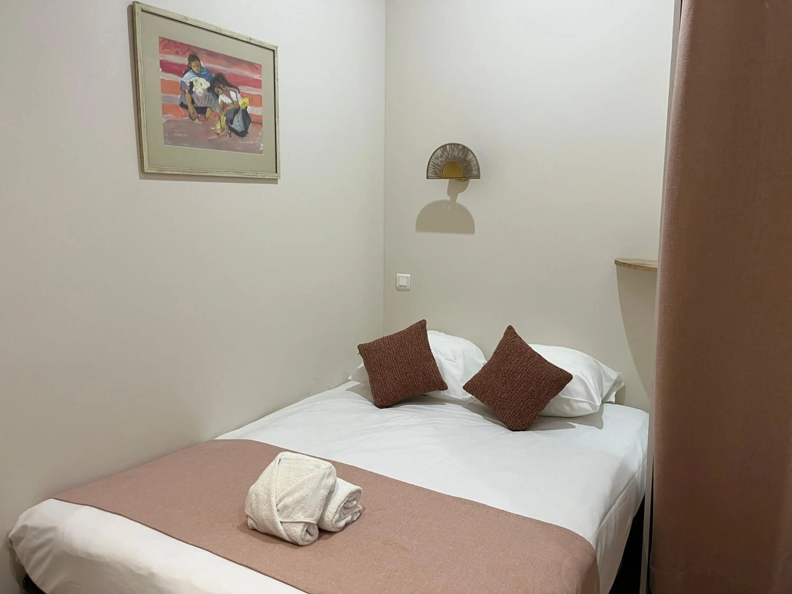 Bed in Nice Garden Hotel