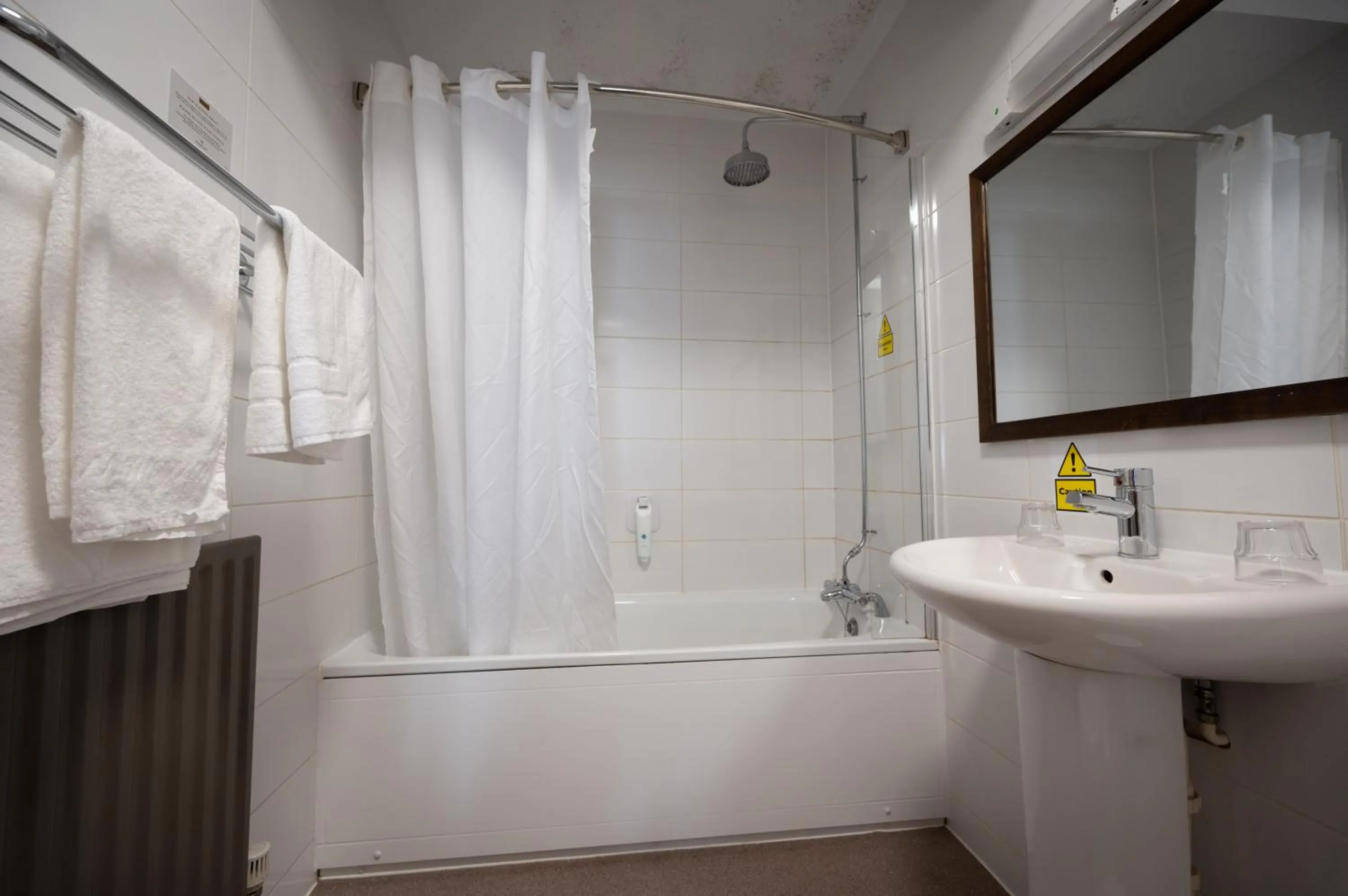 Bathroom in Cocked Hat by Greene King Inns