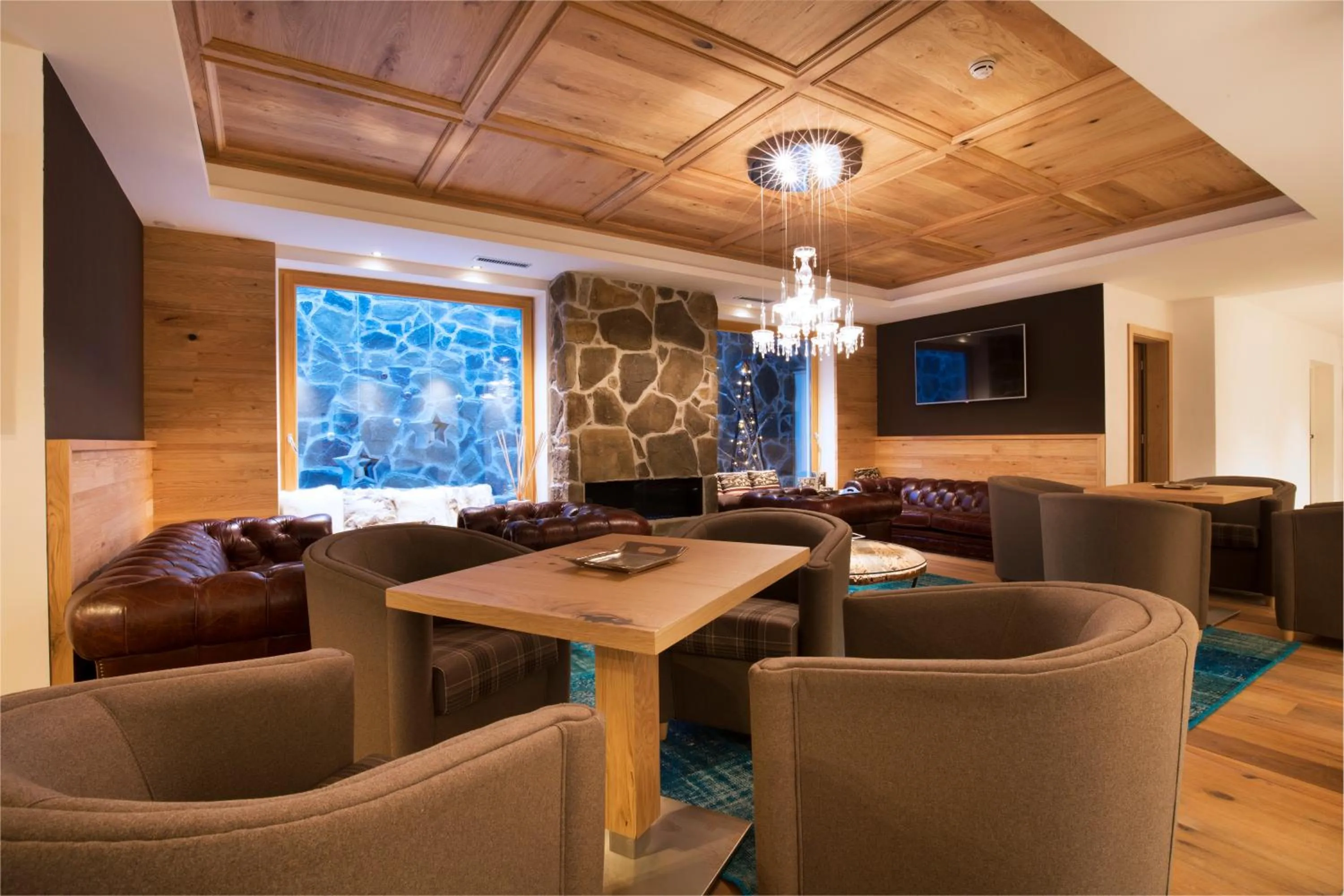 Communal lounge/ TV room in Chalet Marcora