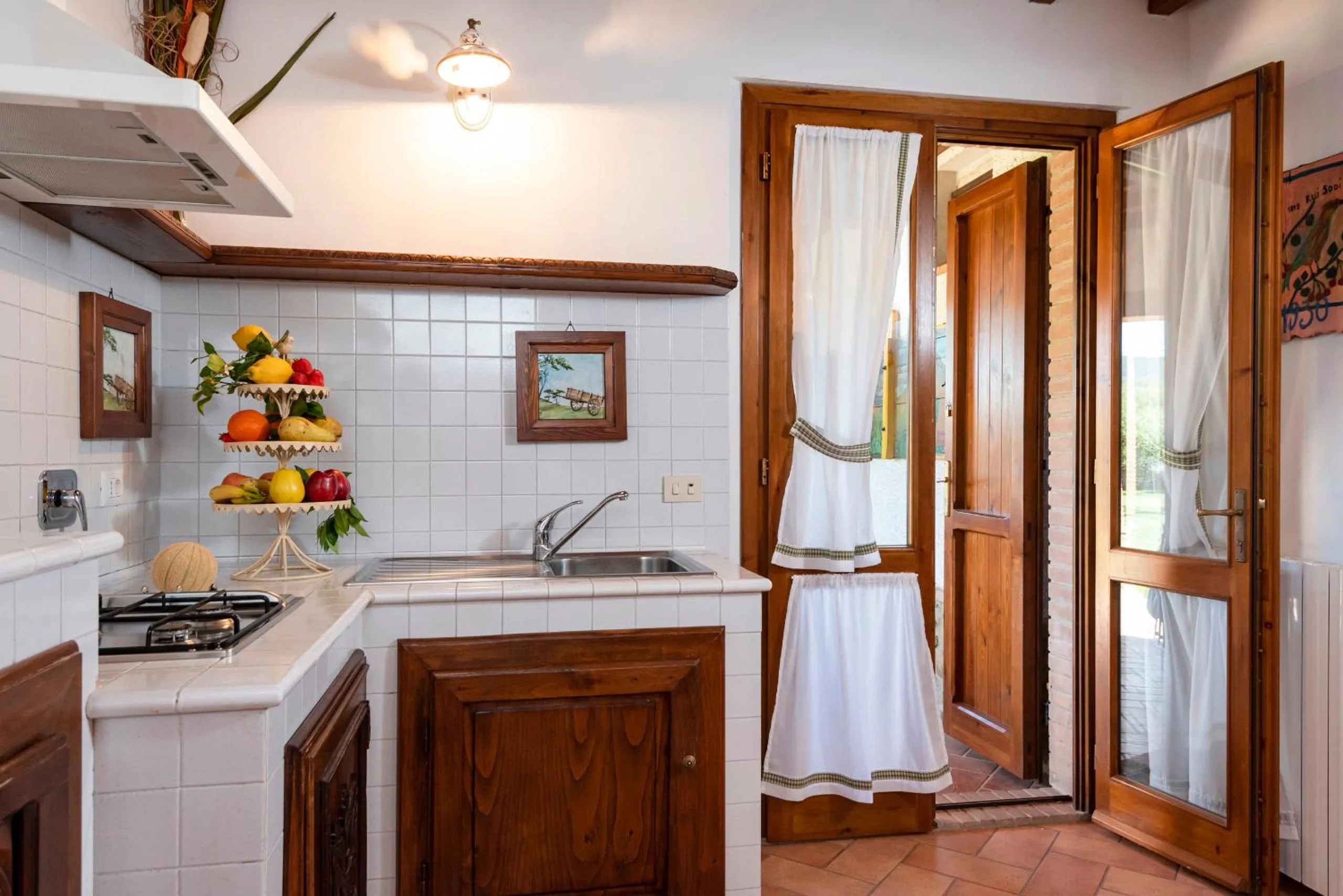 Kitchen or kitchenette in Agriturismo La Rombaia