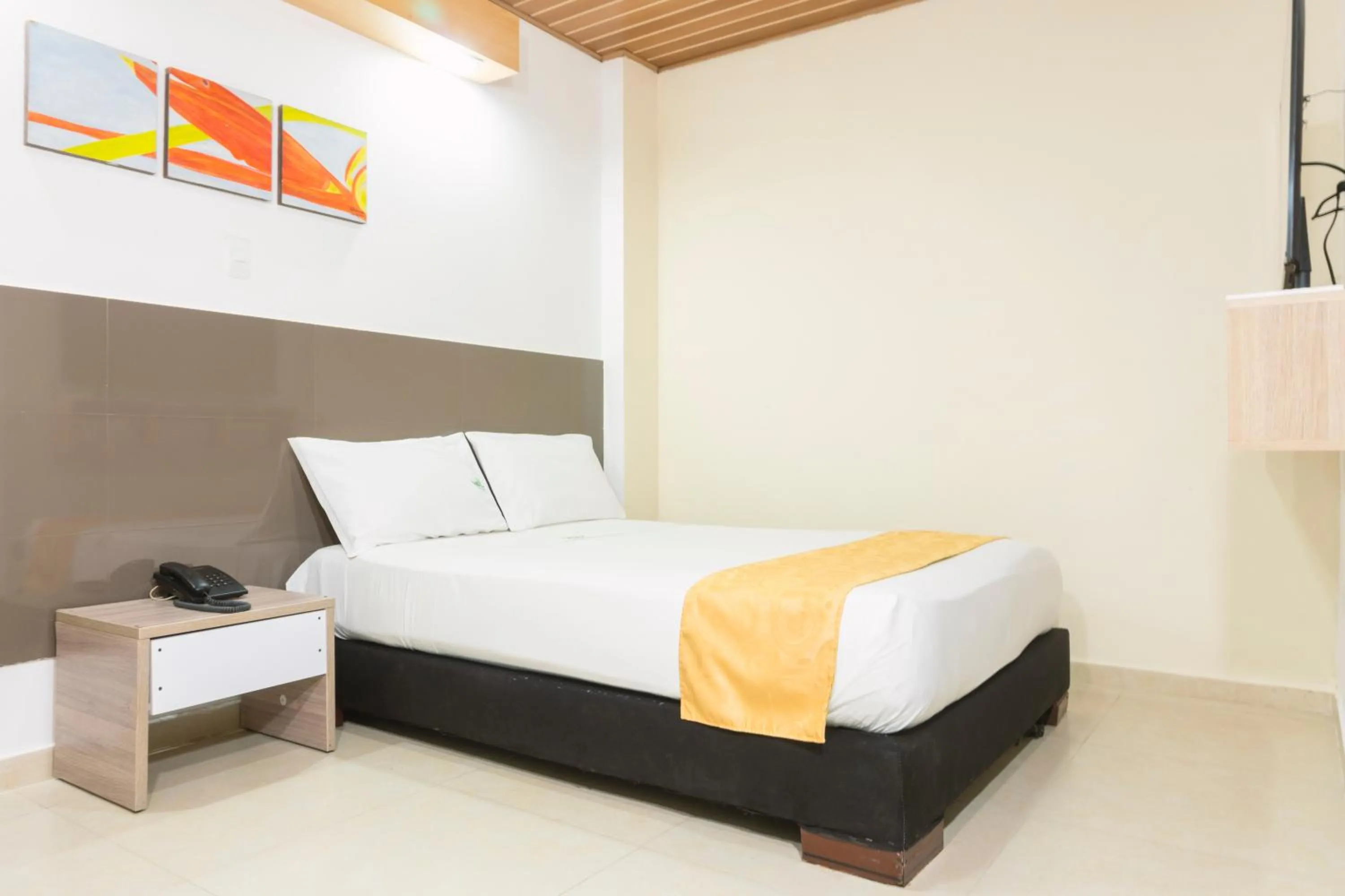 Bed in Waira Suites