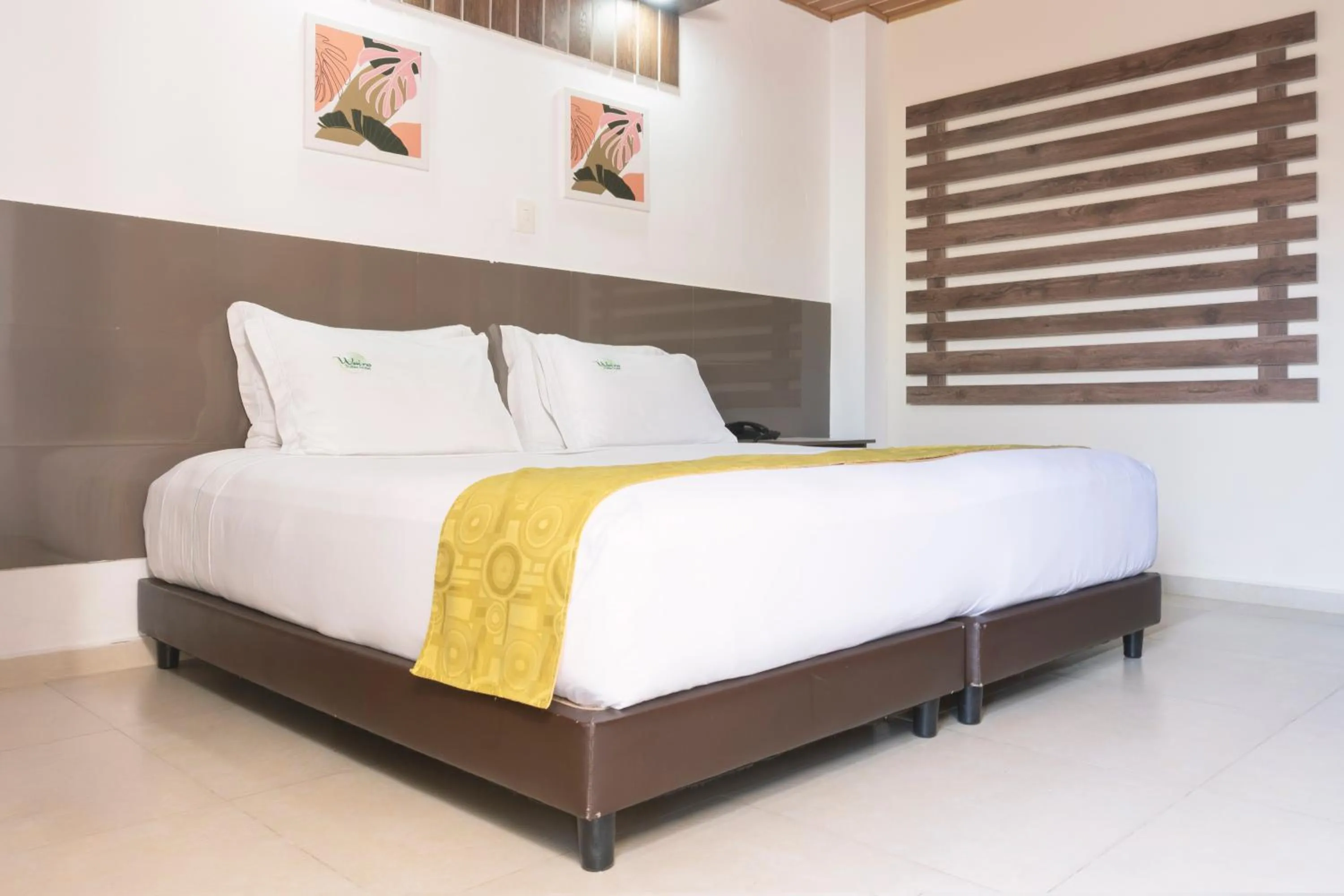 Bed in Waira Suites