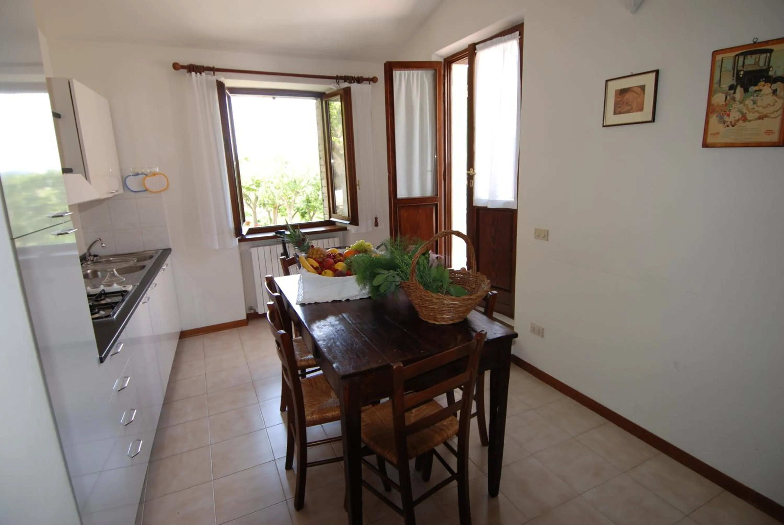 Kitchen or kitchenette in L'Oasi