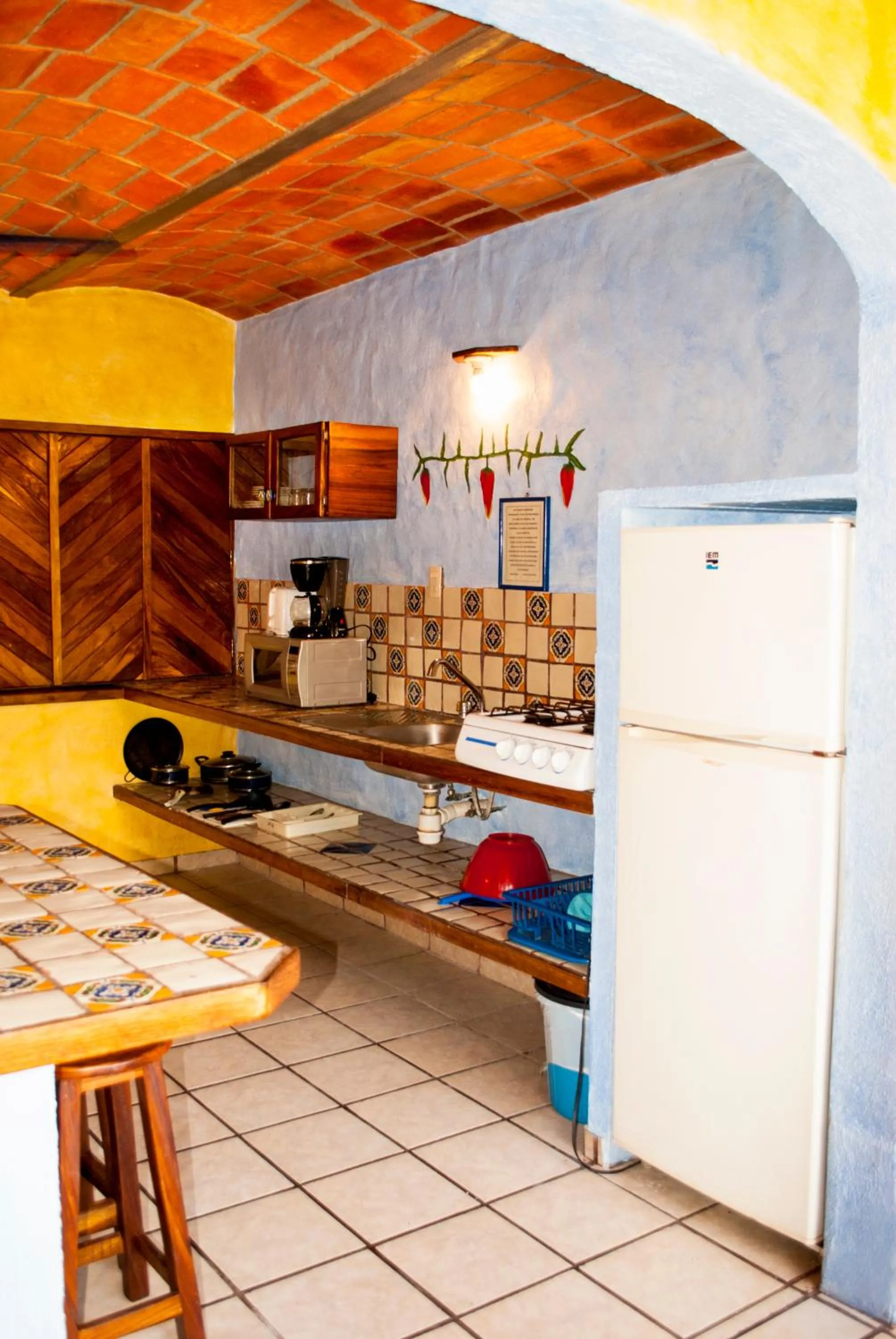 Kitchen or kitchenette in Cabañas del Capitan