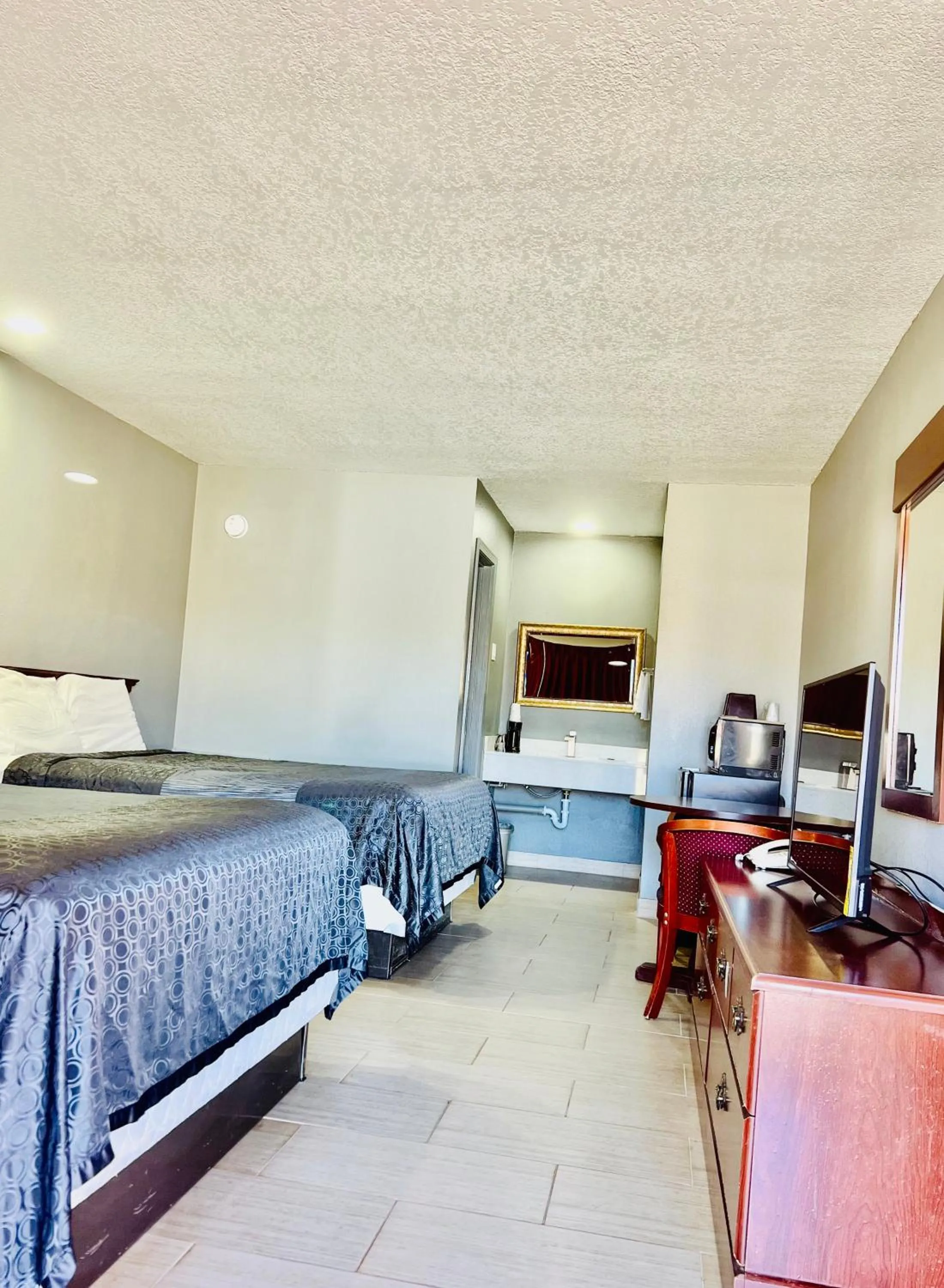 Bed in Palace Motel DEQUEEN