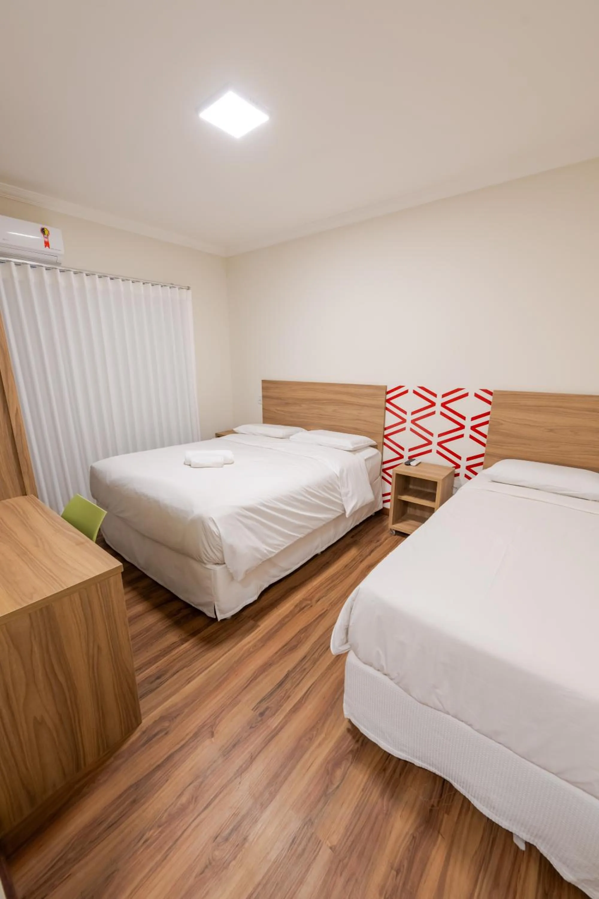 Bed in Vektor Hotéis - Unidade Mariana