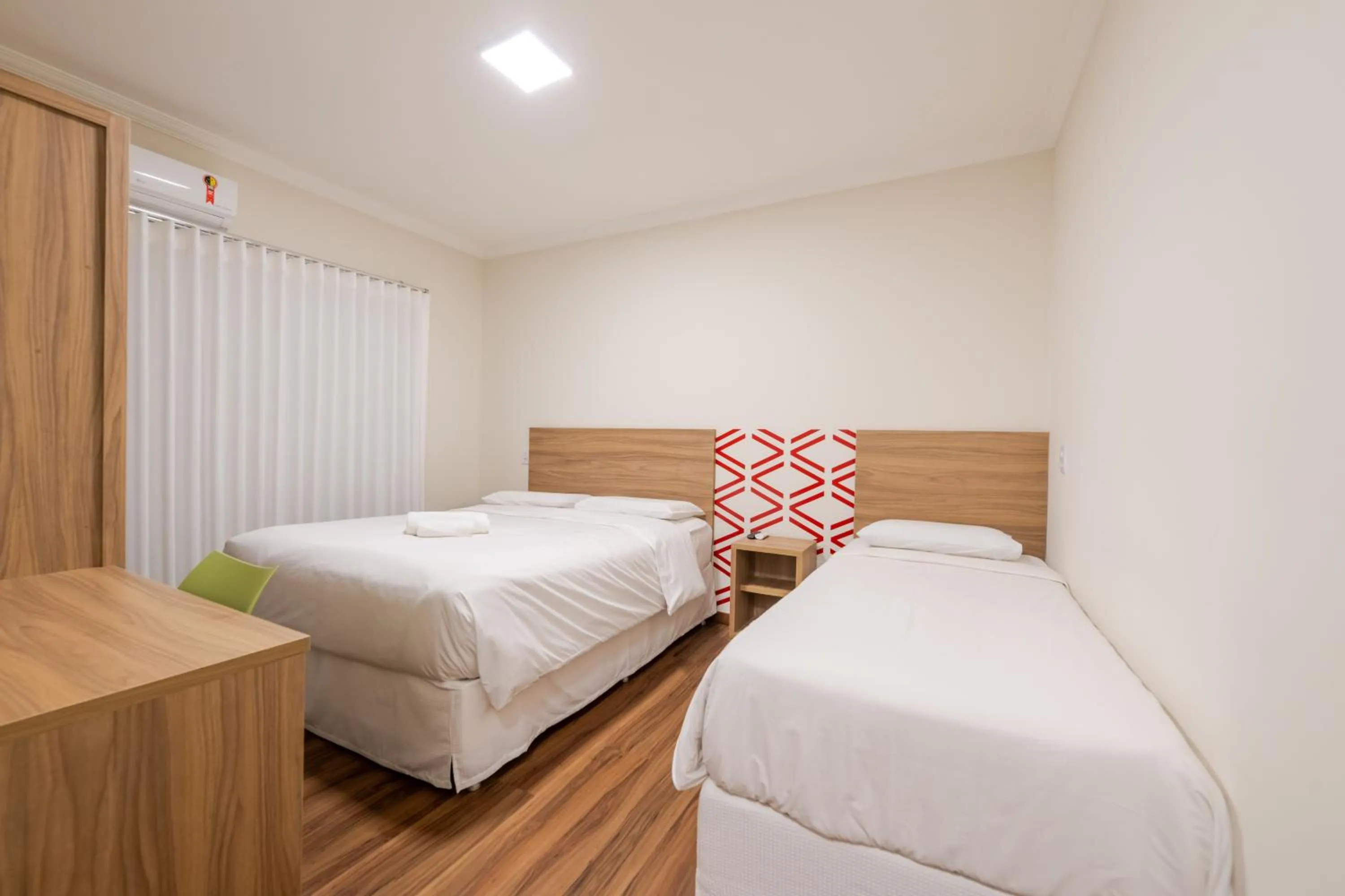 Bed in Vektor Hotéis - Unidade Mariana