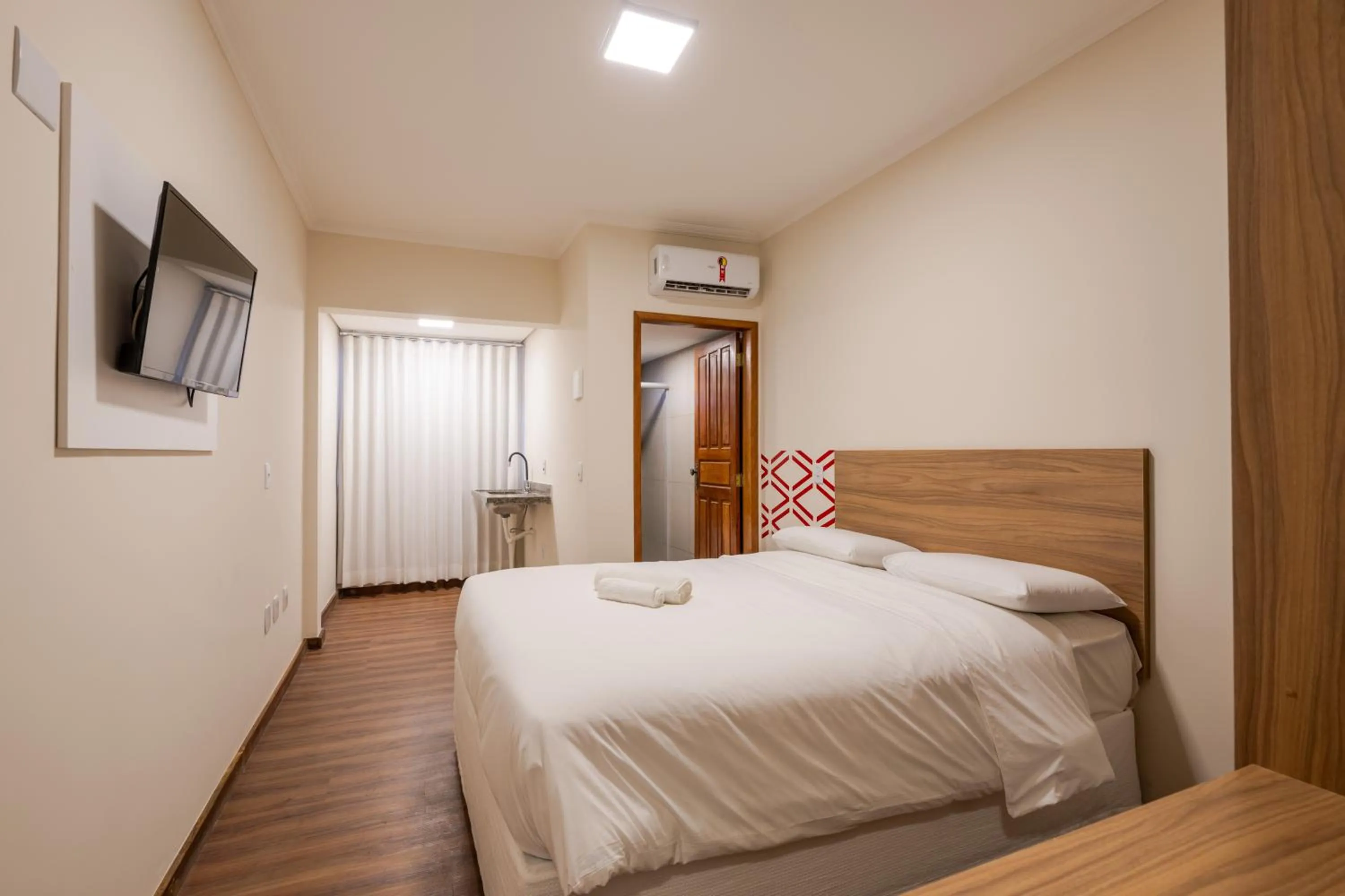 Bed in Vektor Hotéis - Unidade Mariana