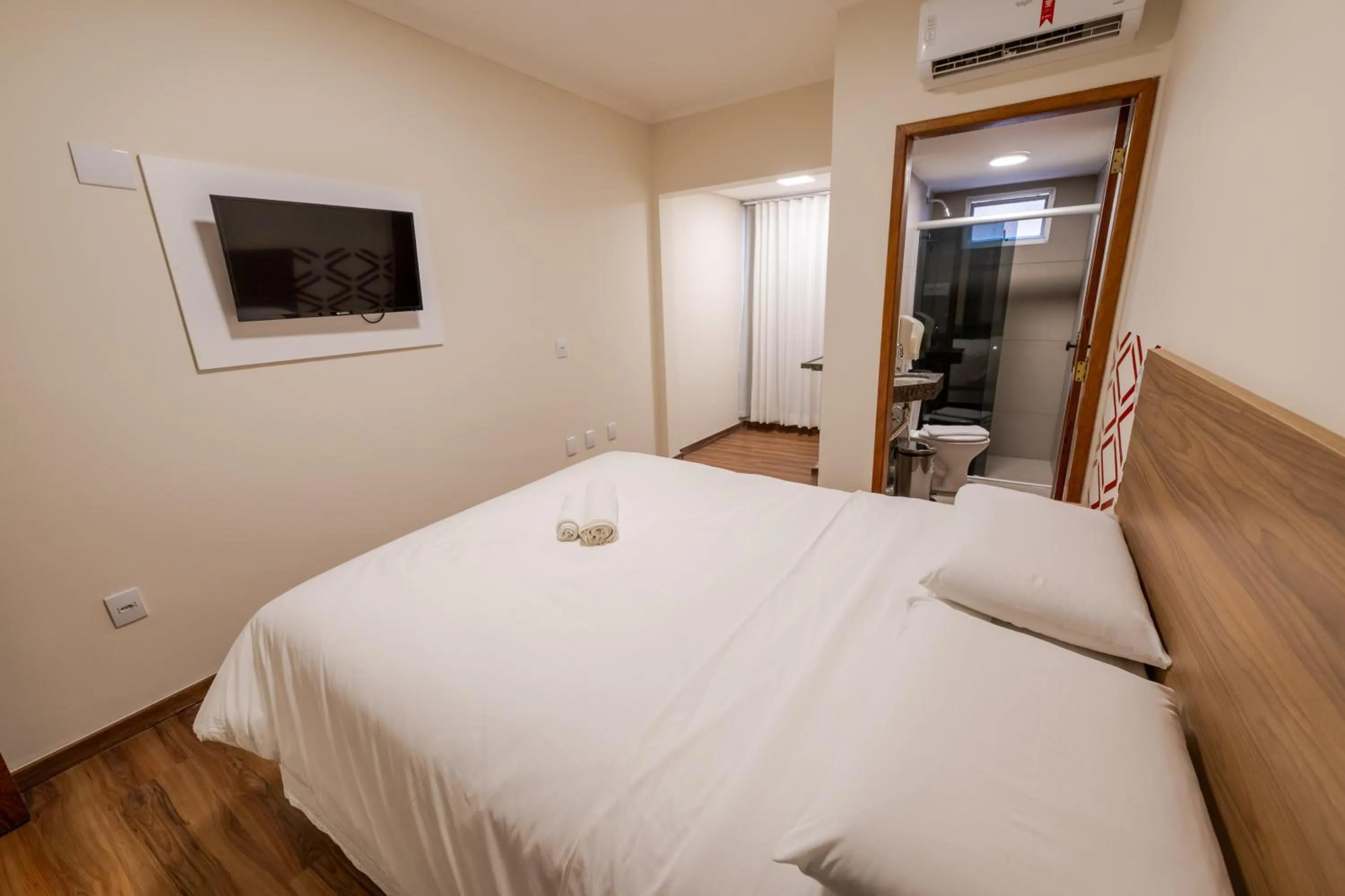 Bed in Vektor Hotéis - Unidade Mariana