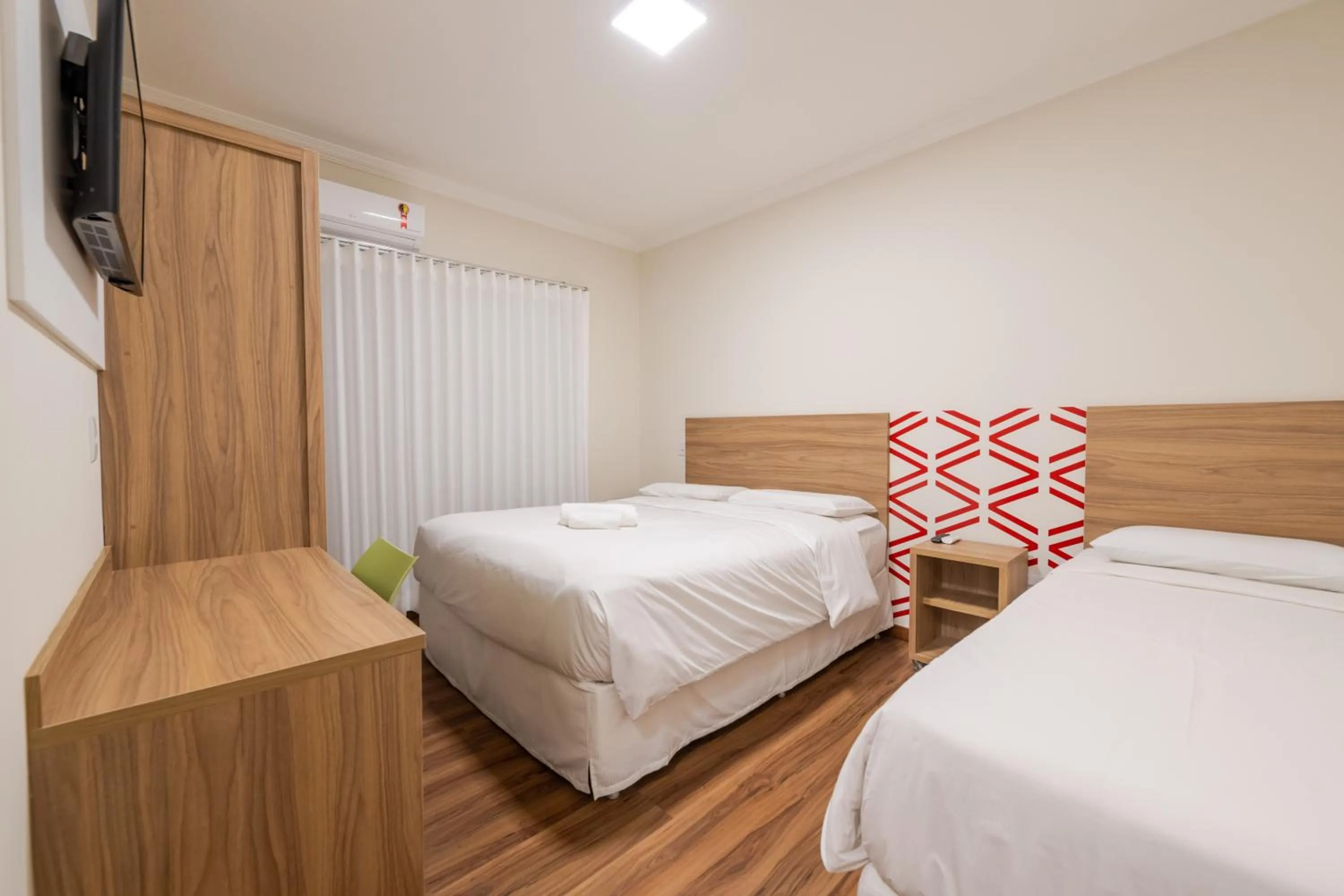 Bed in Vektor Hotéis - Unidade Mariana