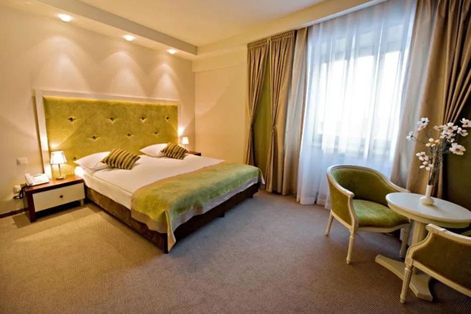 Seating area, Bed in Hotel Prezydencki 4-star