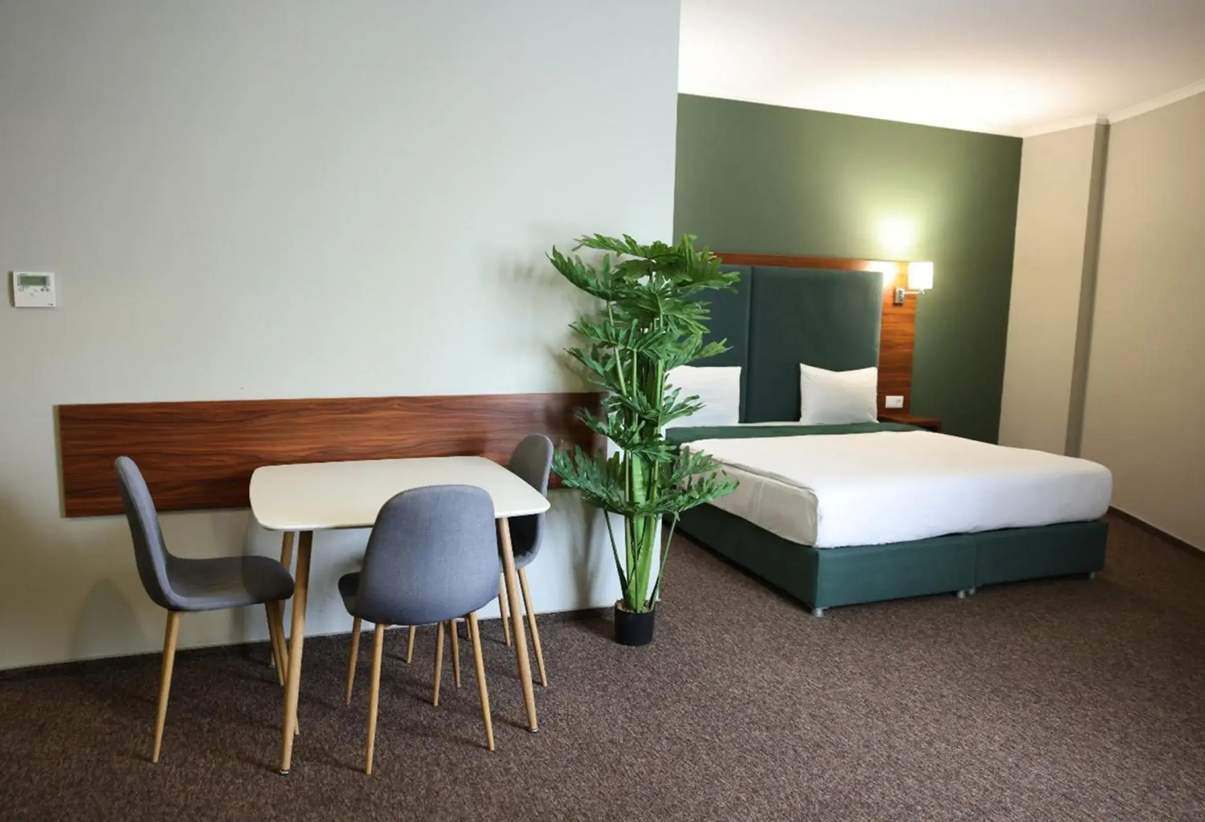 Bed in Green Tower Hotel Bed in Green Tower Hotel