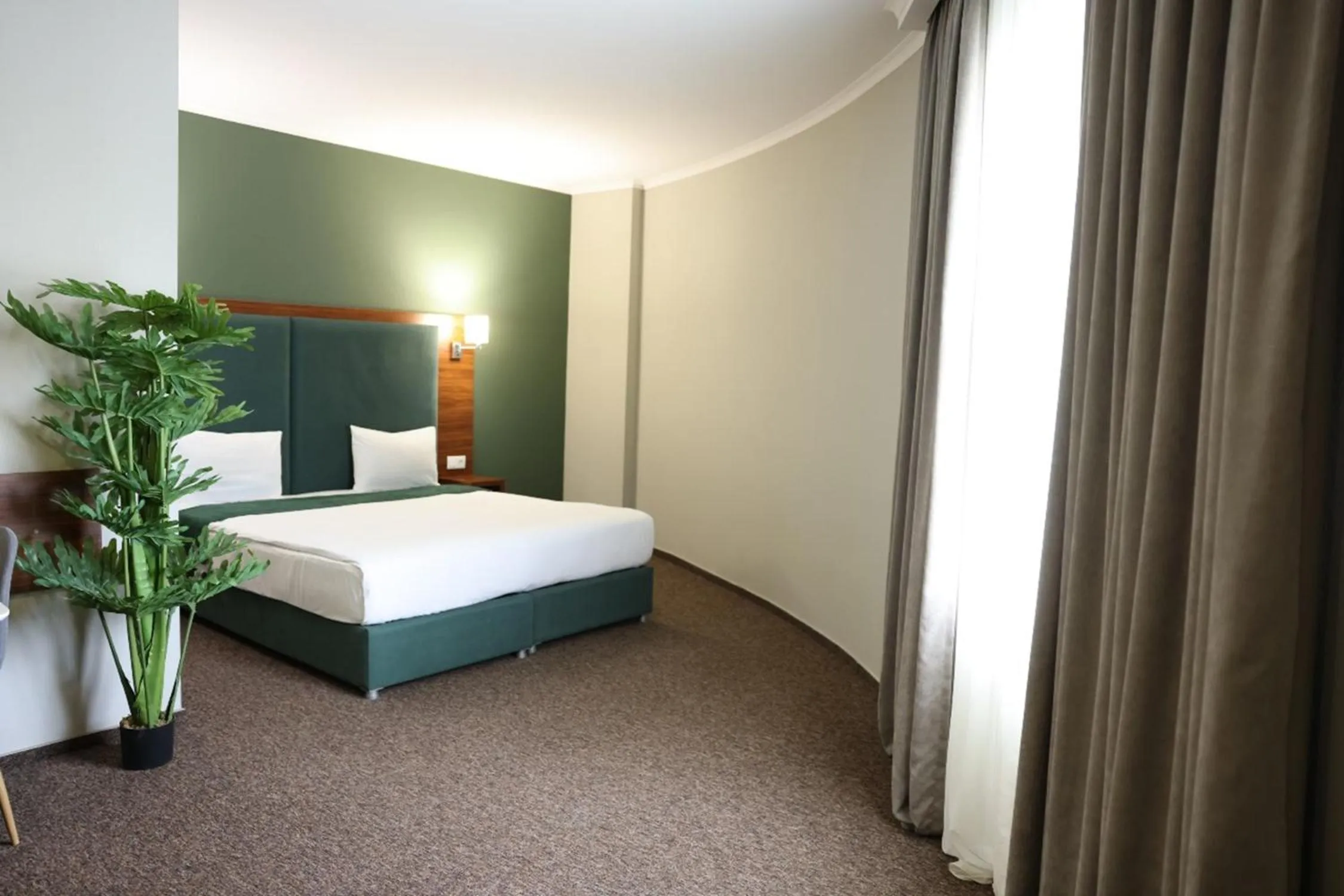 Bed in Green Tower Hotel