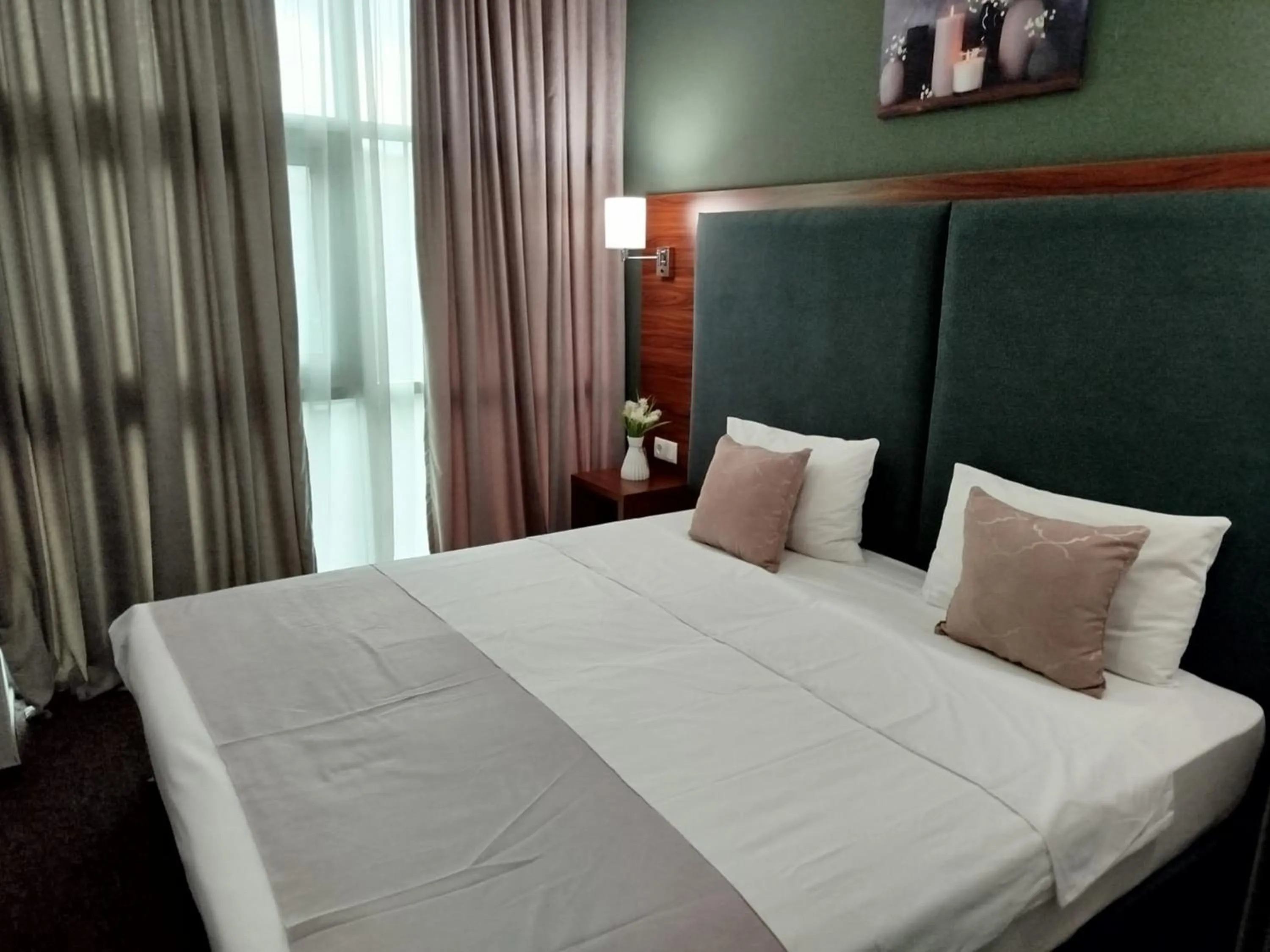 Bed in Green Tower Hotel