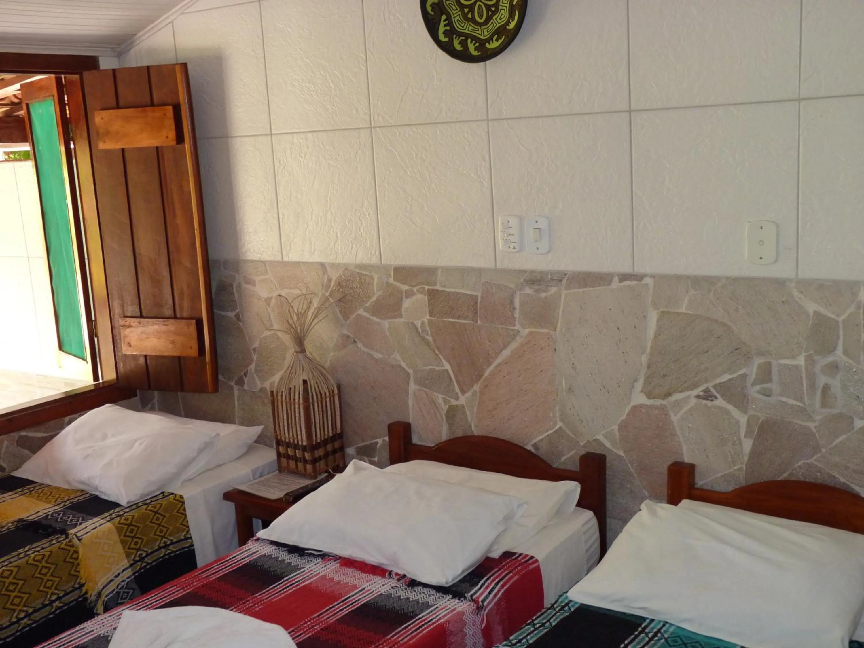 Bed in Pousada Meu Sossego