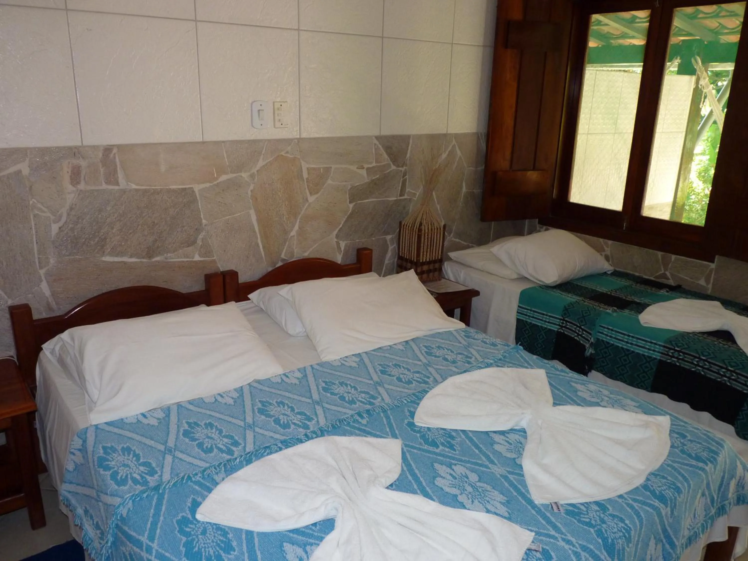 Bed in Pousada Meu Sossego