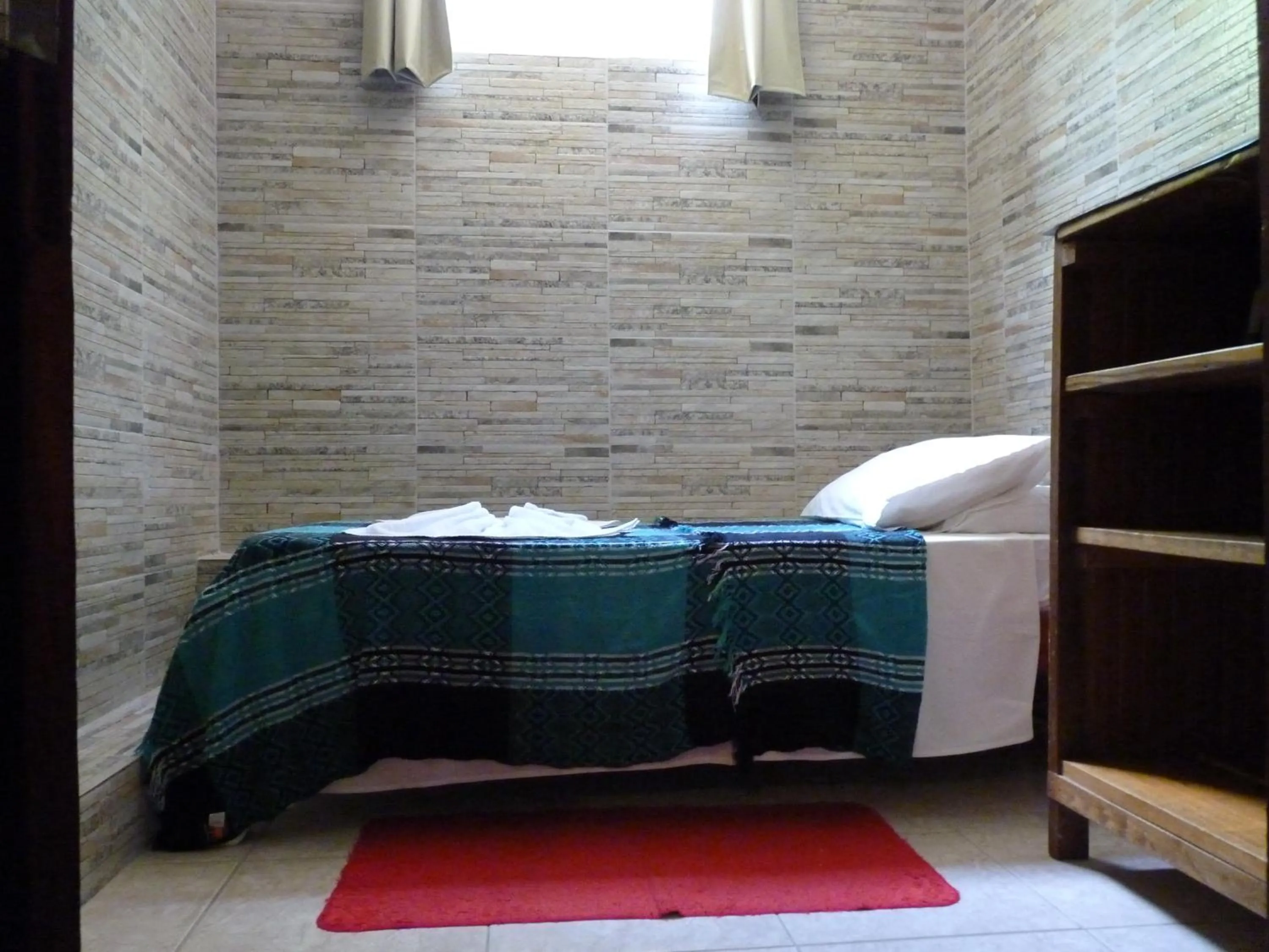 Bed in Pousada Meu Sossego