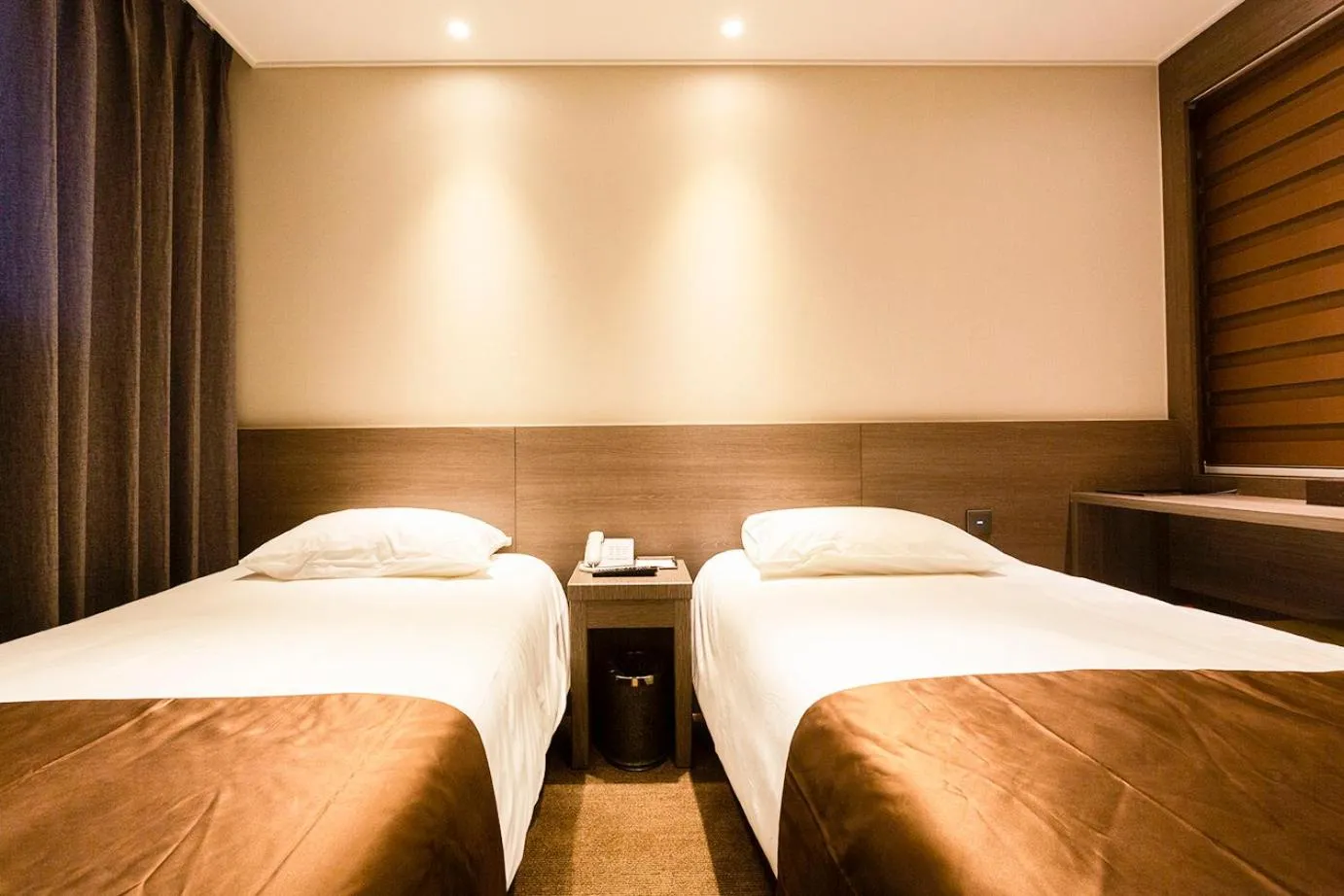 Photo of the whole room, Bed in Grandmillions Hotel Seogwipo