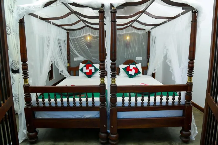 Bed in Goyambokka Guesthouse