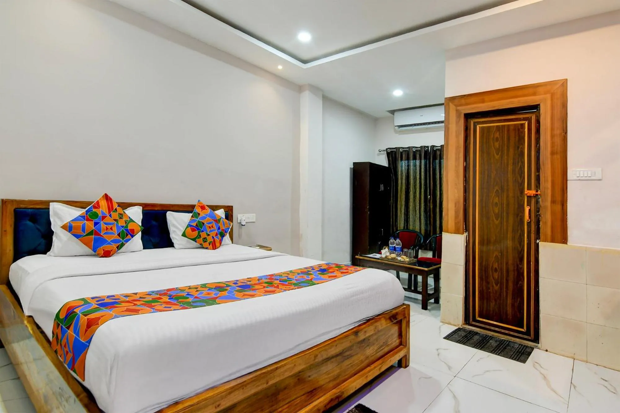 Bed in FabHotel Seven Inn