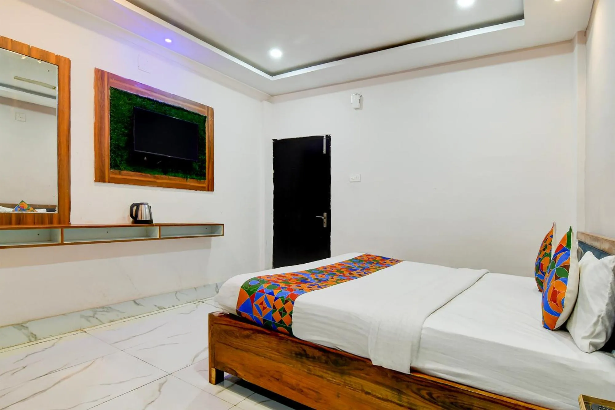 Bed in FabHotel Seven Inn