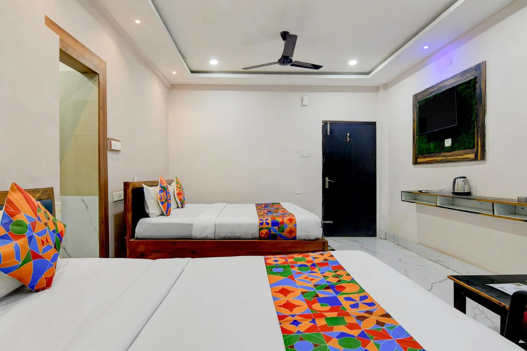 Bed in FabHotel Seven Inn