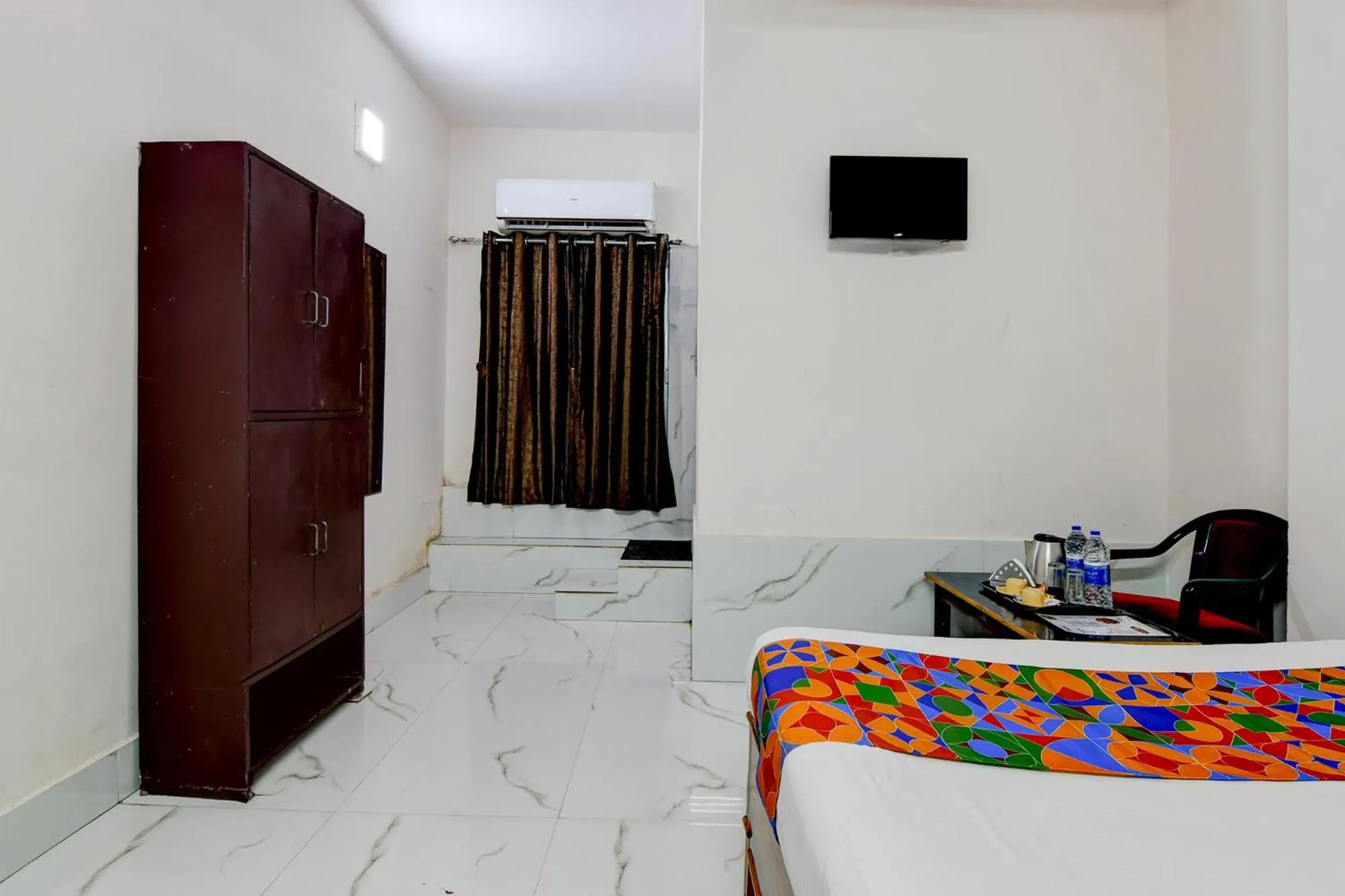 Bed in FabHotel Seven Inn