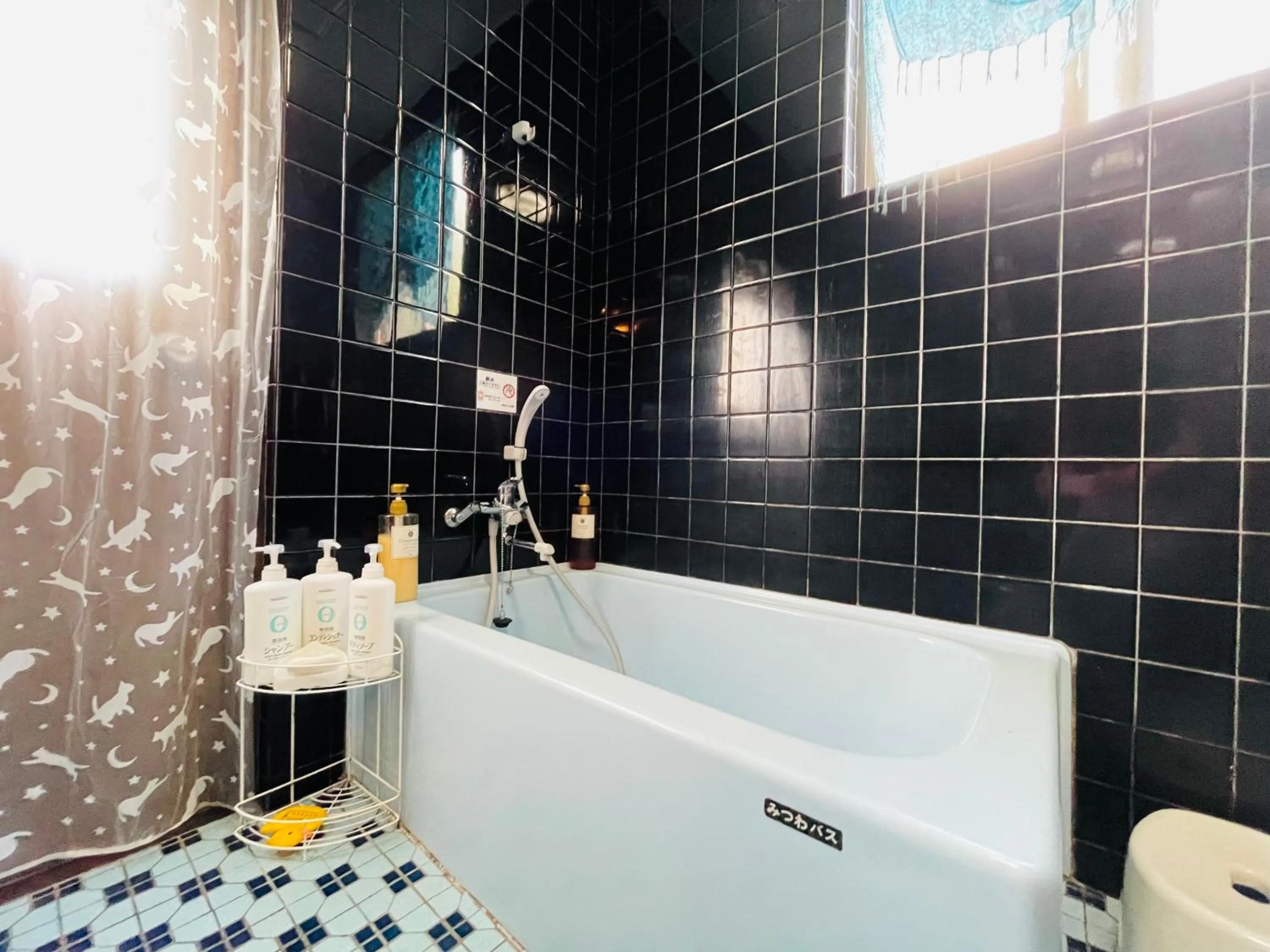 Shower in Milk-ya Women-Only Guest House