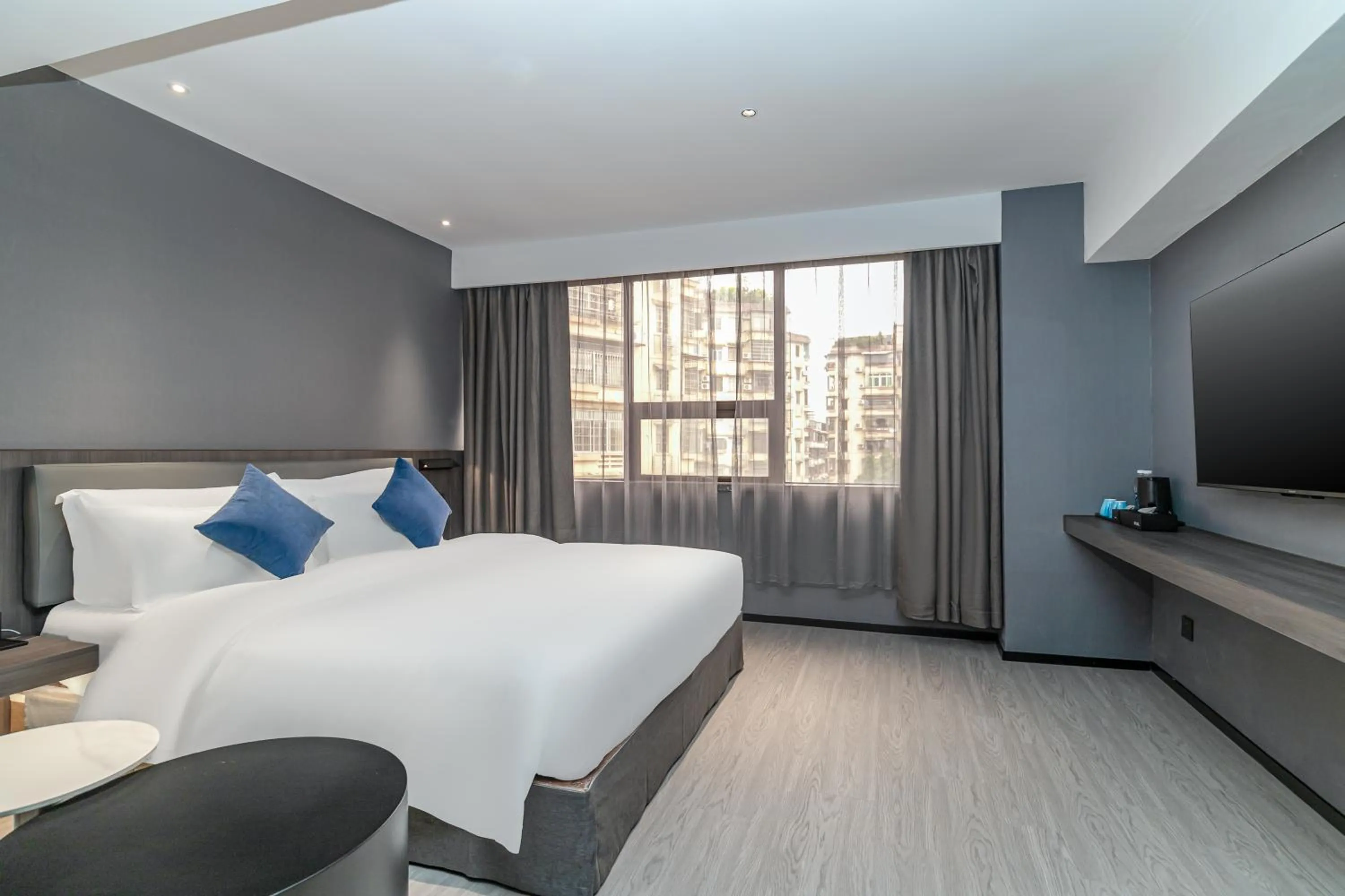 Bedroom, Bed in Insail Hotels (Guangyuanxincun Jingtai Pedestrian Street Guangzhou)