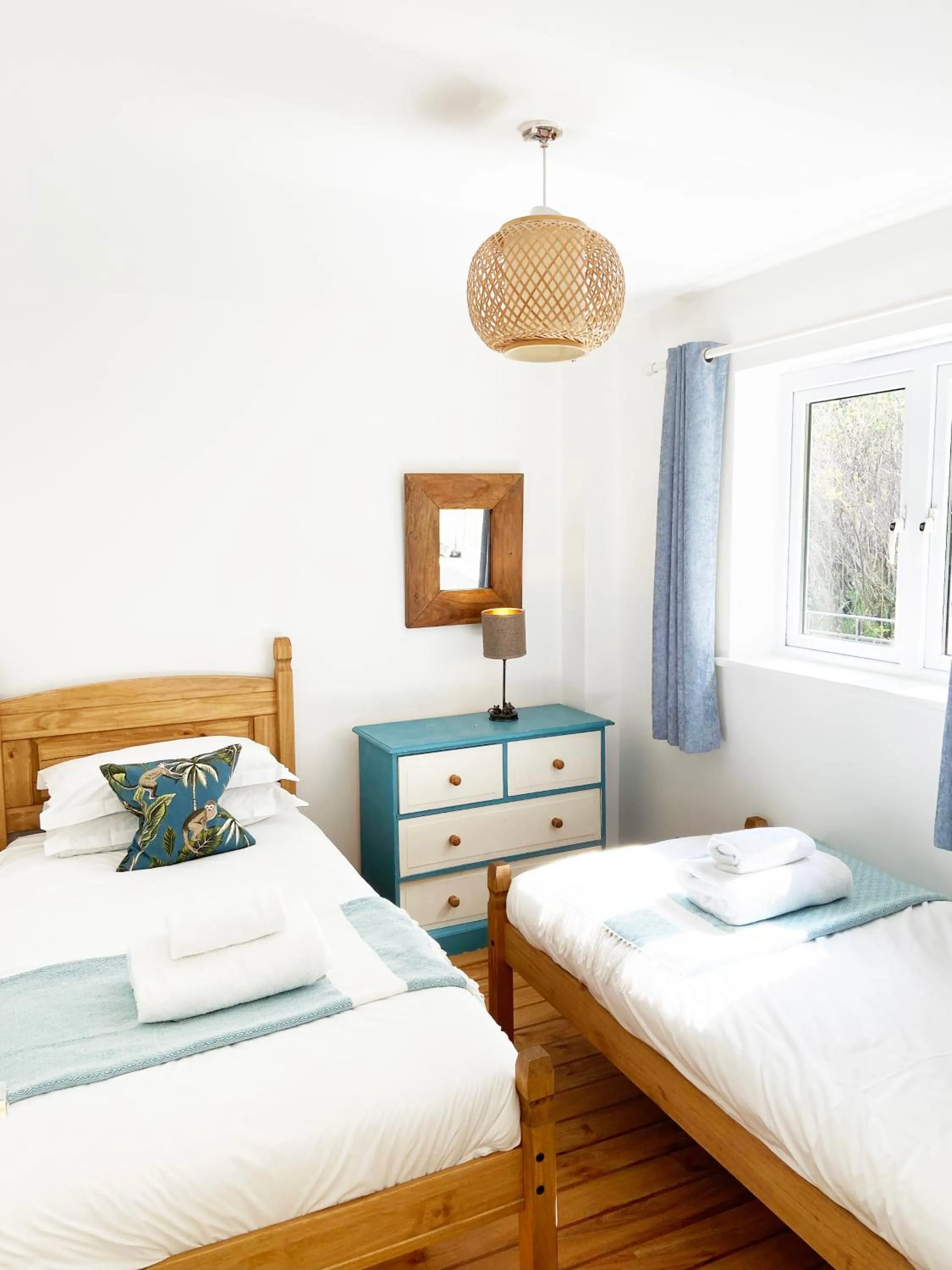 Bed in Tolcarne Beach Apartments