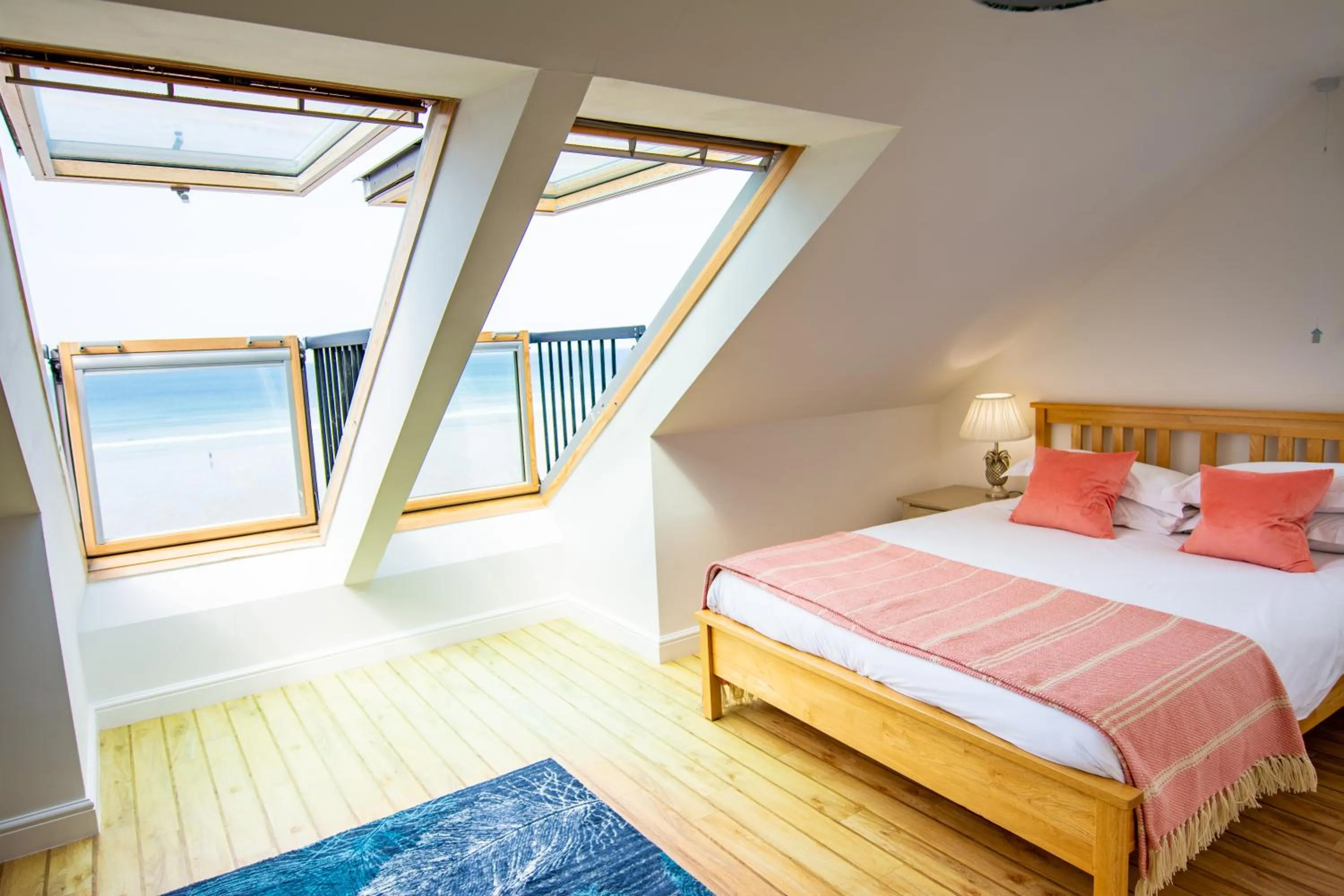 Bed in Tolcarne Beach Apartments