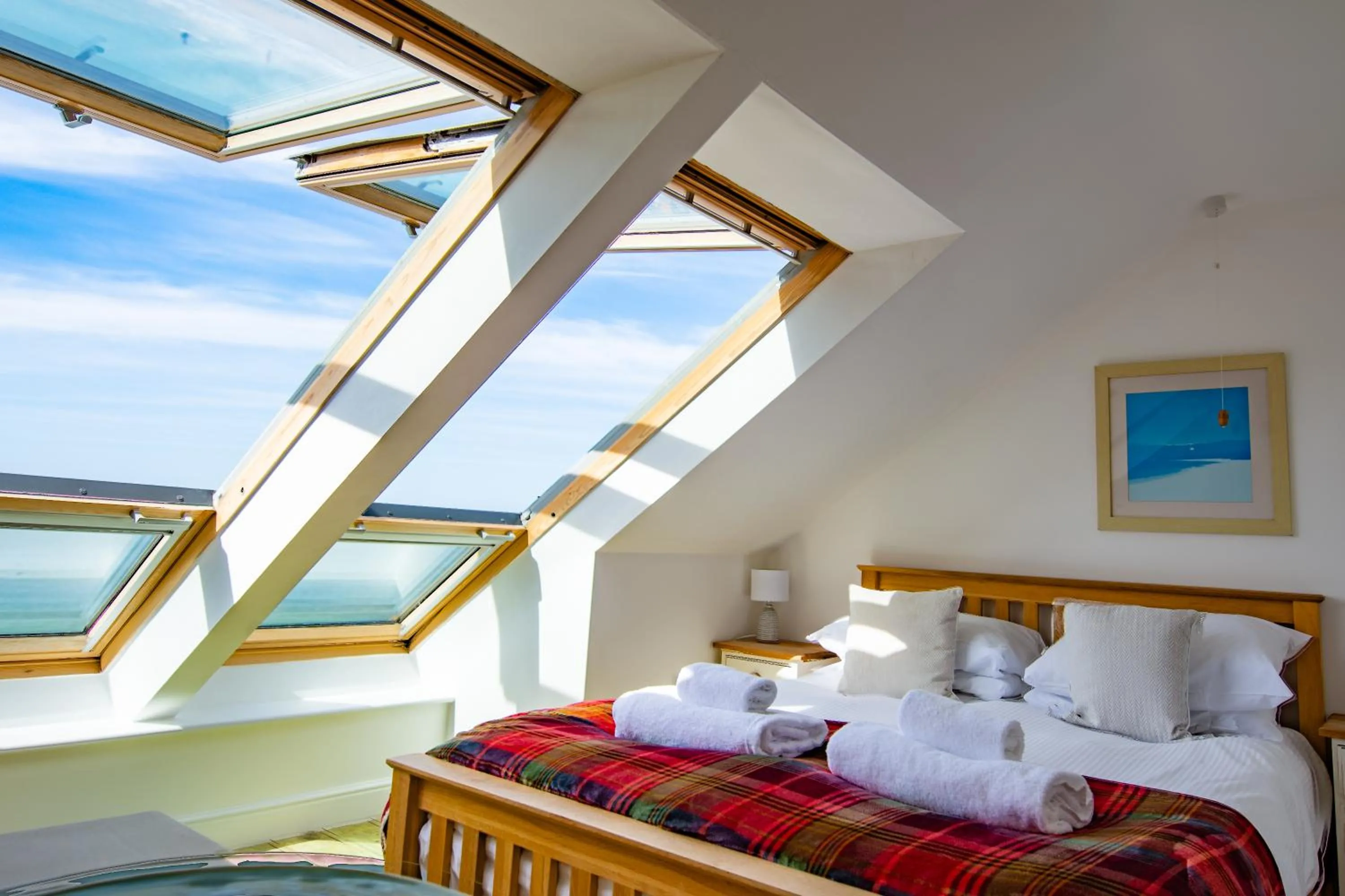 Bed in Tolcarne Beach Apartments