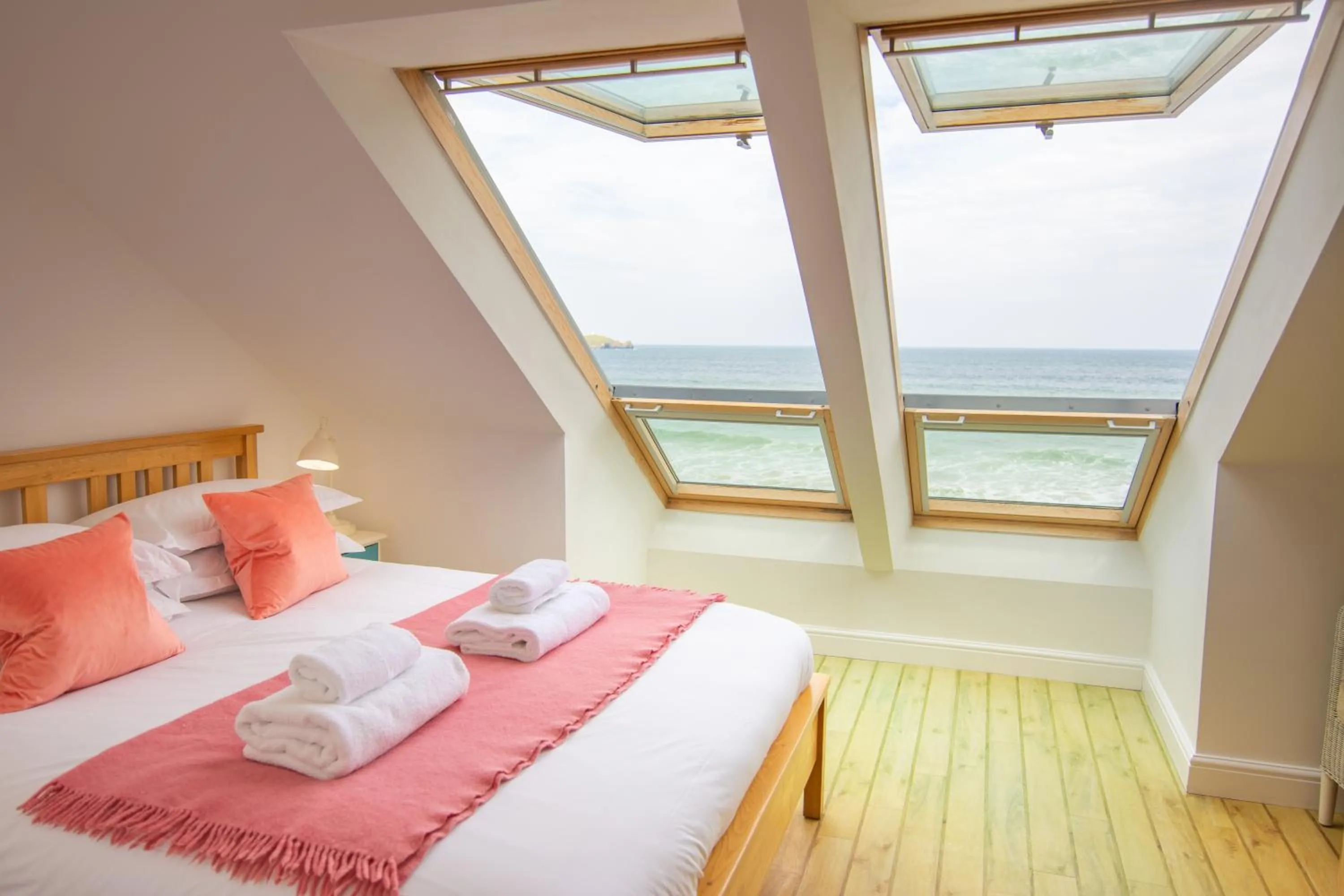 Bed in Tolcarne Beach Apartments