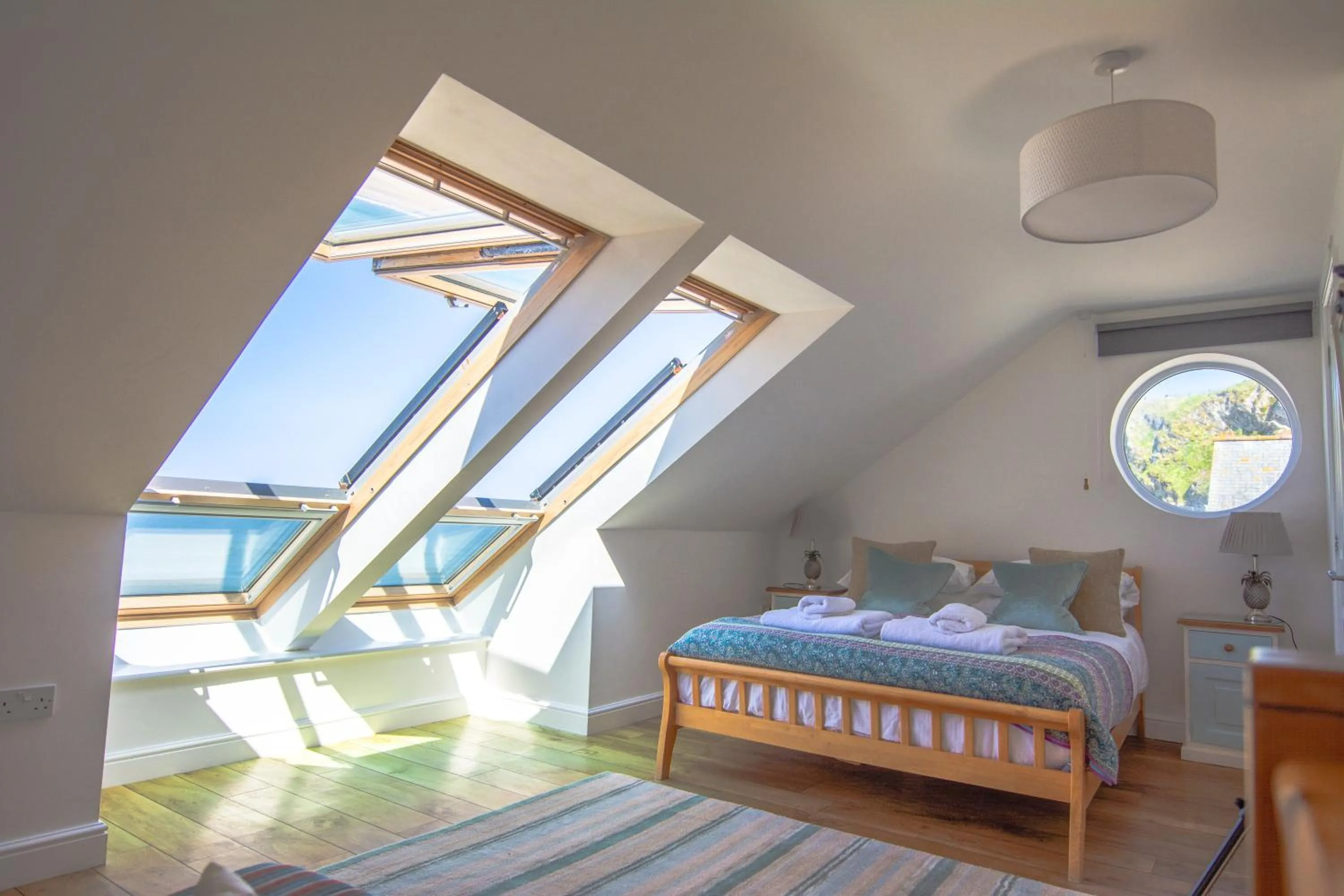 Bed in Tolcarne Beach Apartments