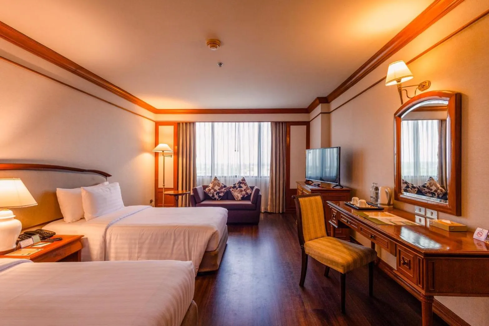 Bed in The Twin Lotus Hotel