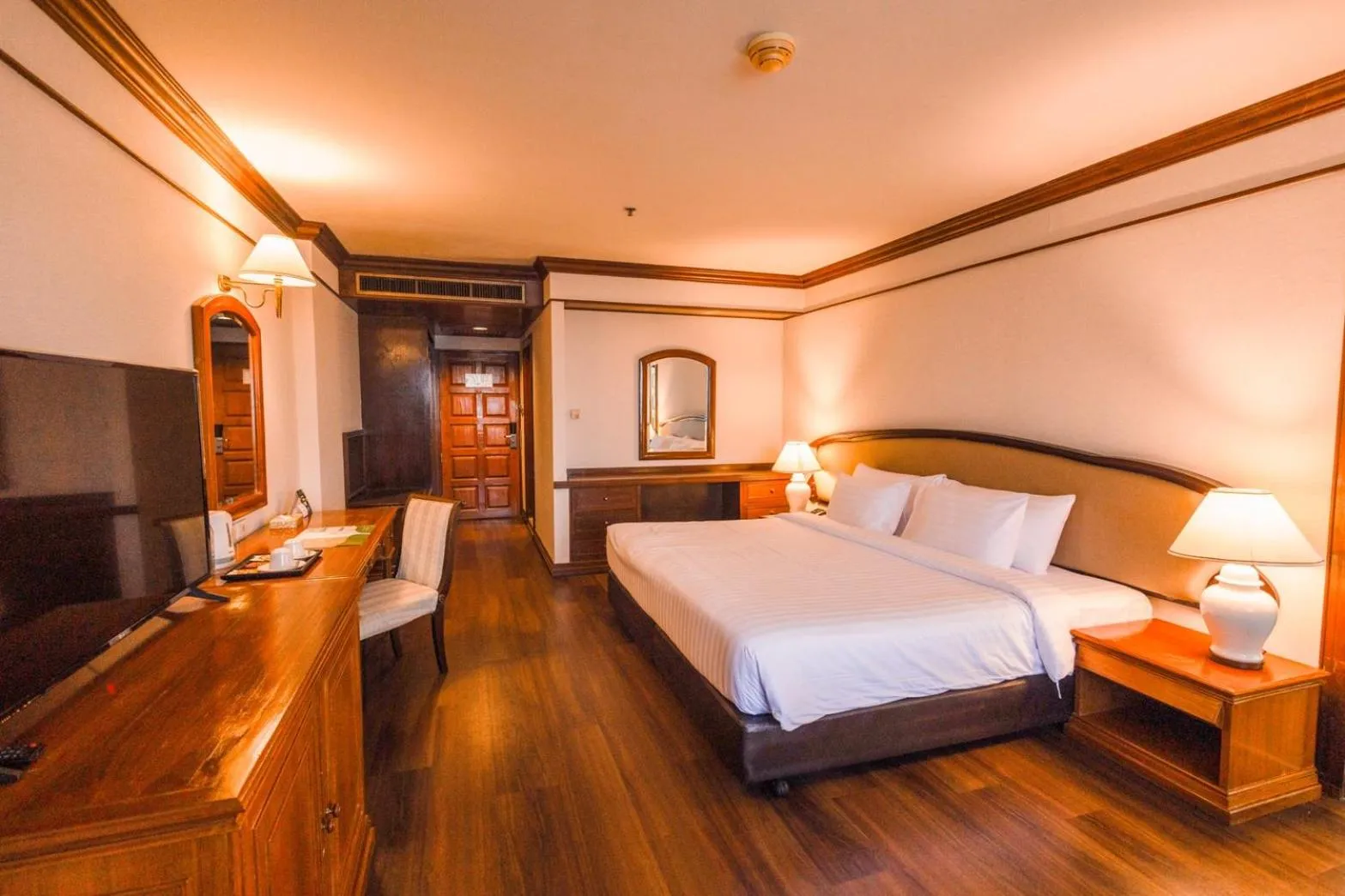 Bed in The Twin Lotus Hotel