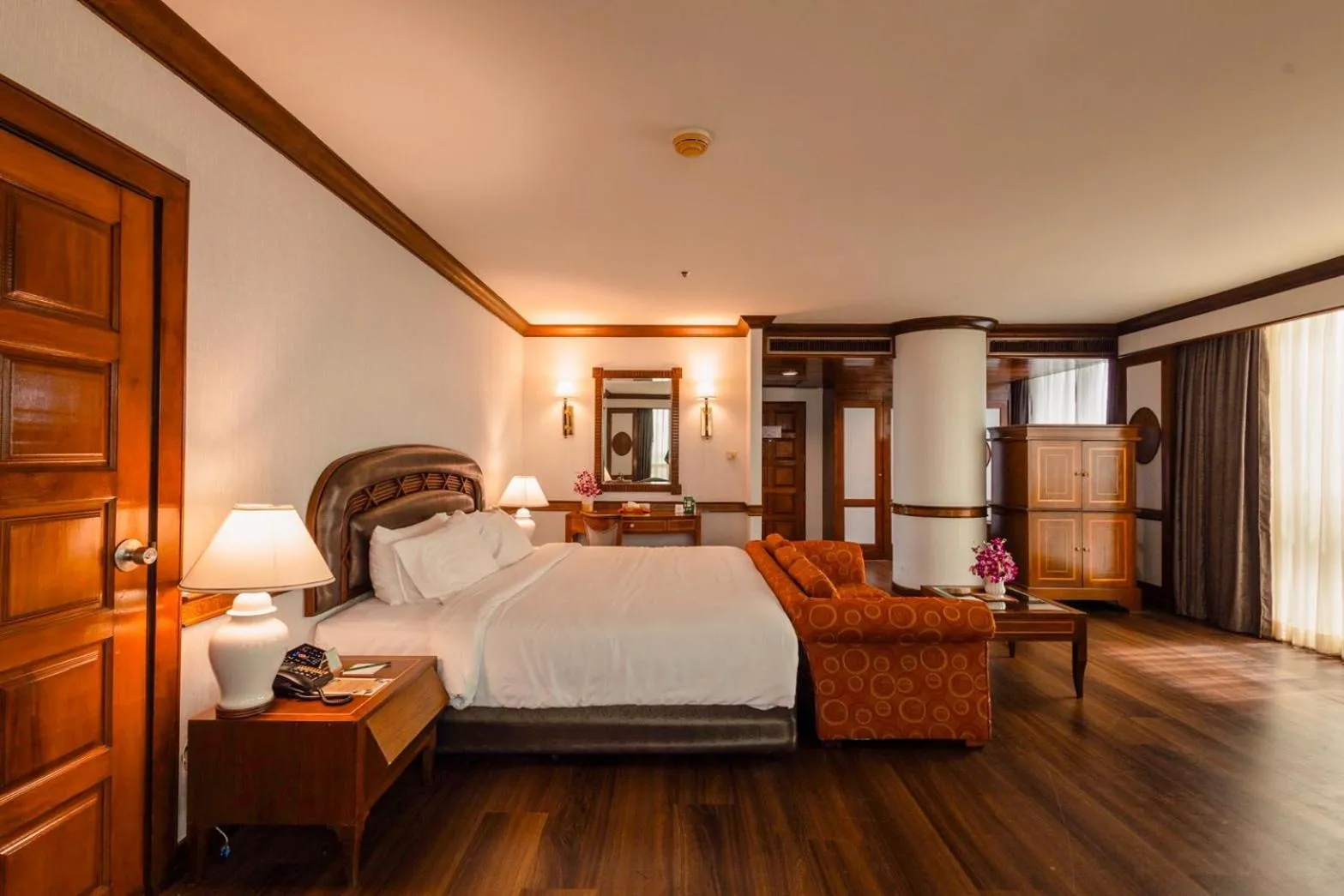 Bed in The Twin Lotus Hotel