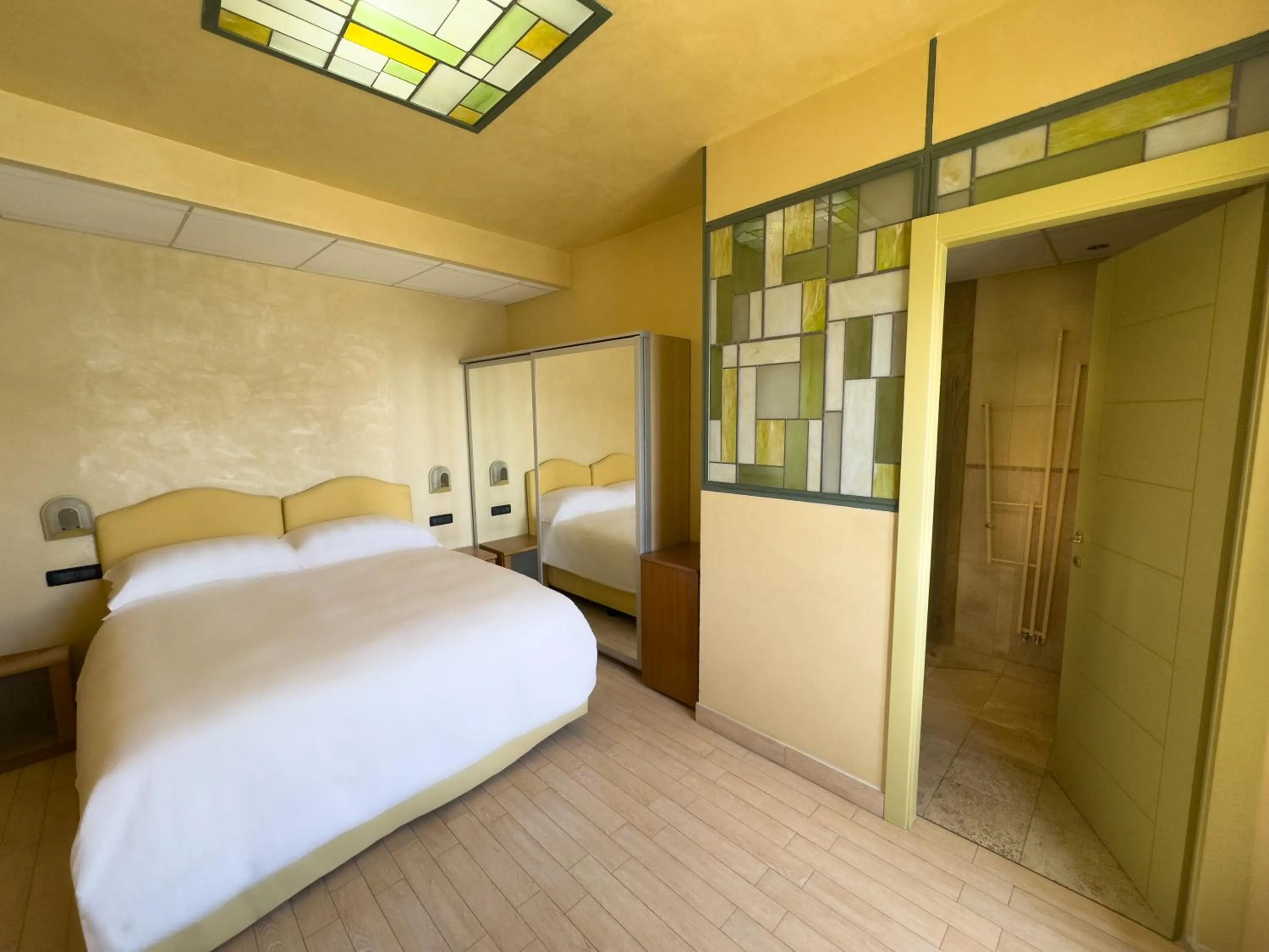 Bed in Jasmin Charme Hotel